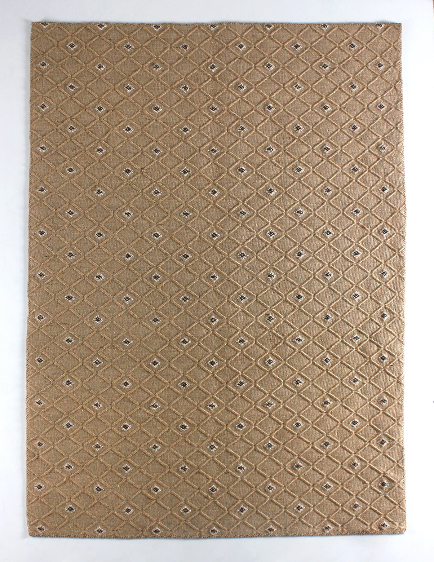 Natural jute geometric washable rug by Netline Home with beige and black patterns, featuring a flatweave design and cotton backing.