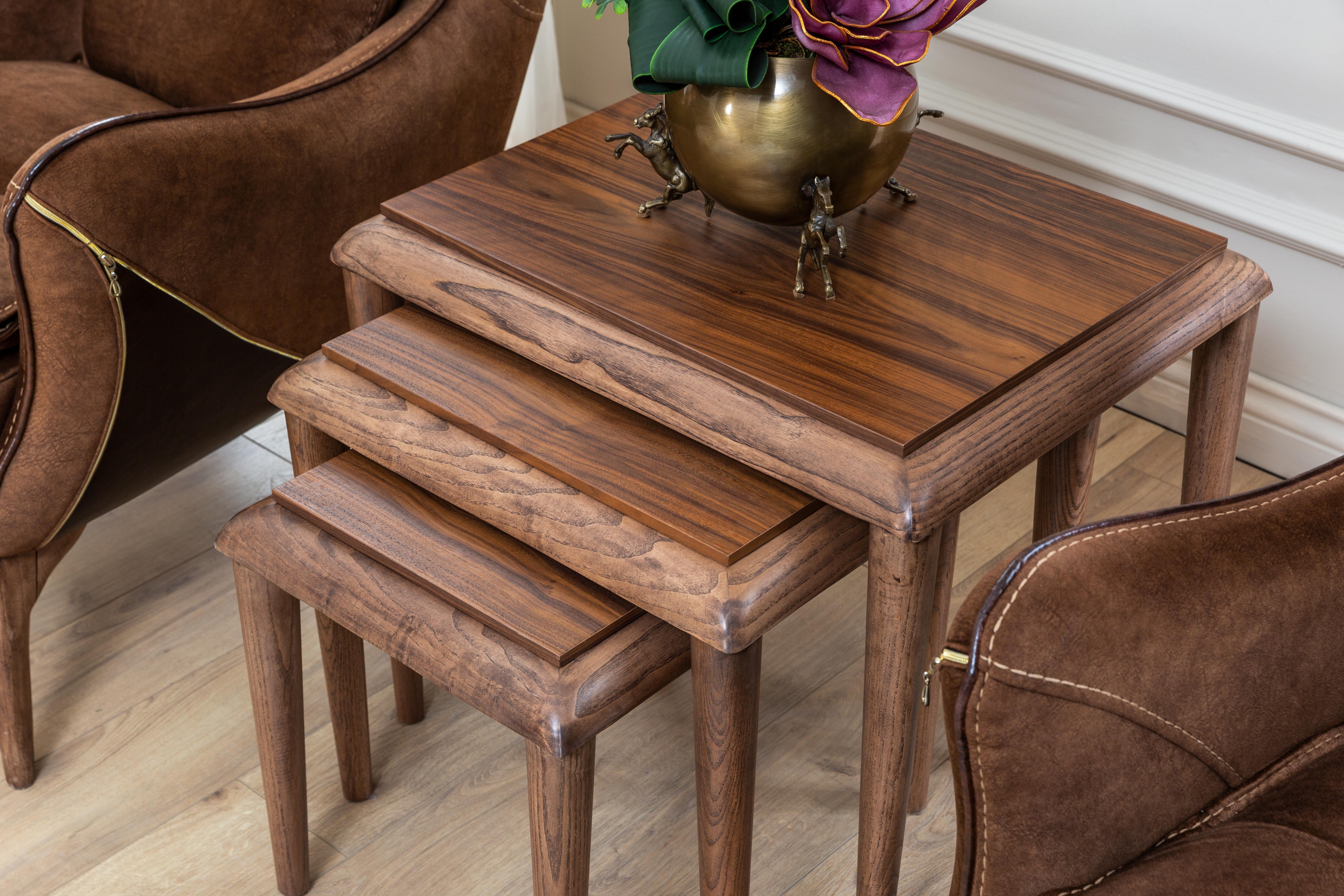 Set of three Lotus Nesting Side Tables by Netline Home Interior, featuring modern design with layered, round tabletops.