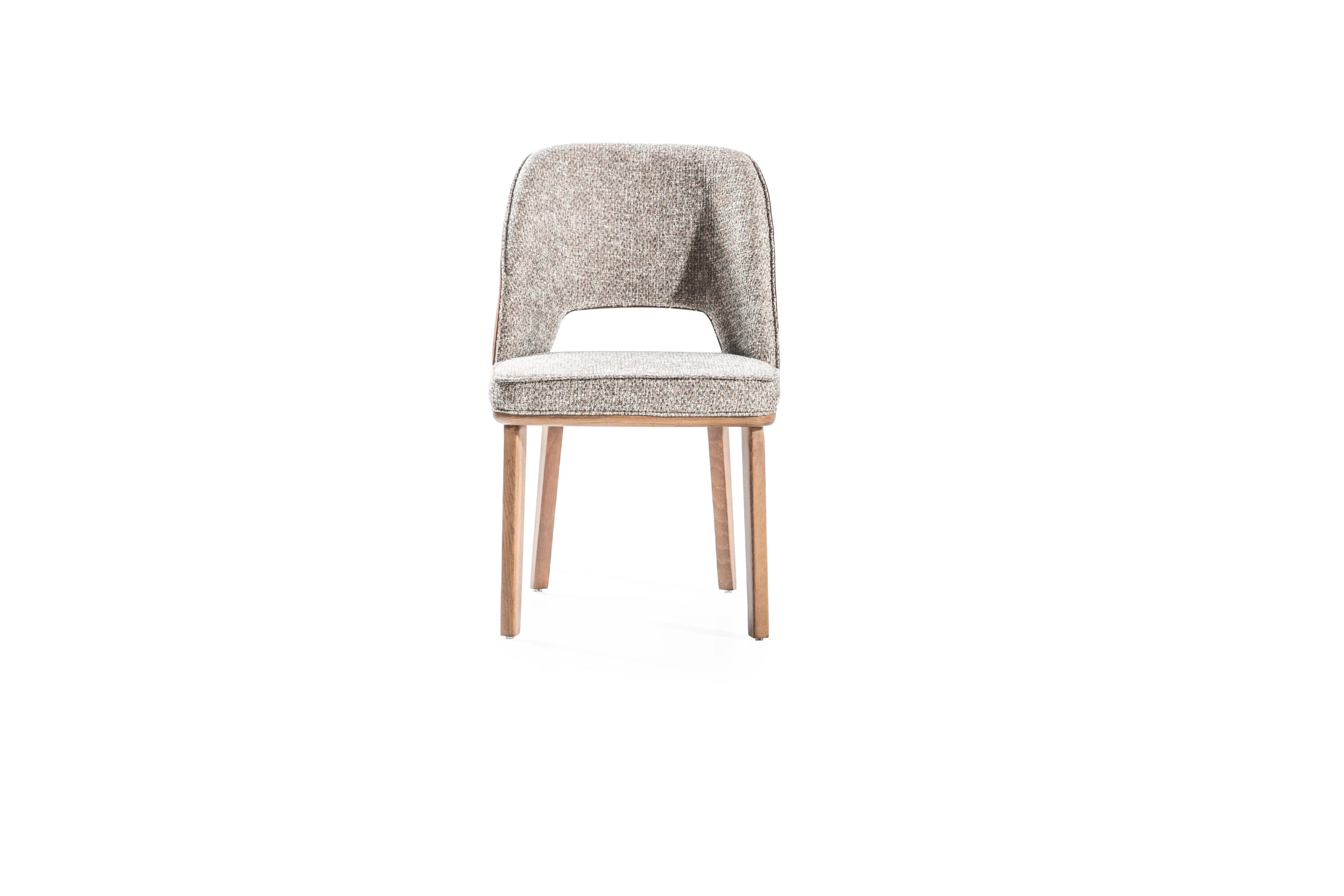 Netline Home Interior Bentley dining chair with upholstered seat and wooden legs, designed for everyday comfort.