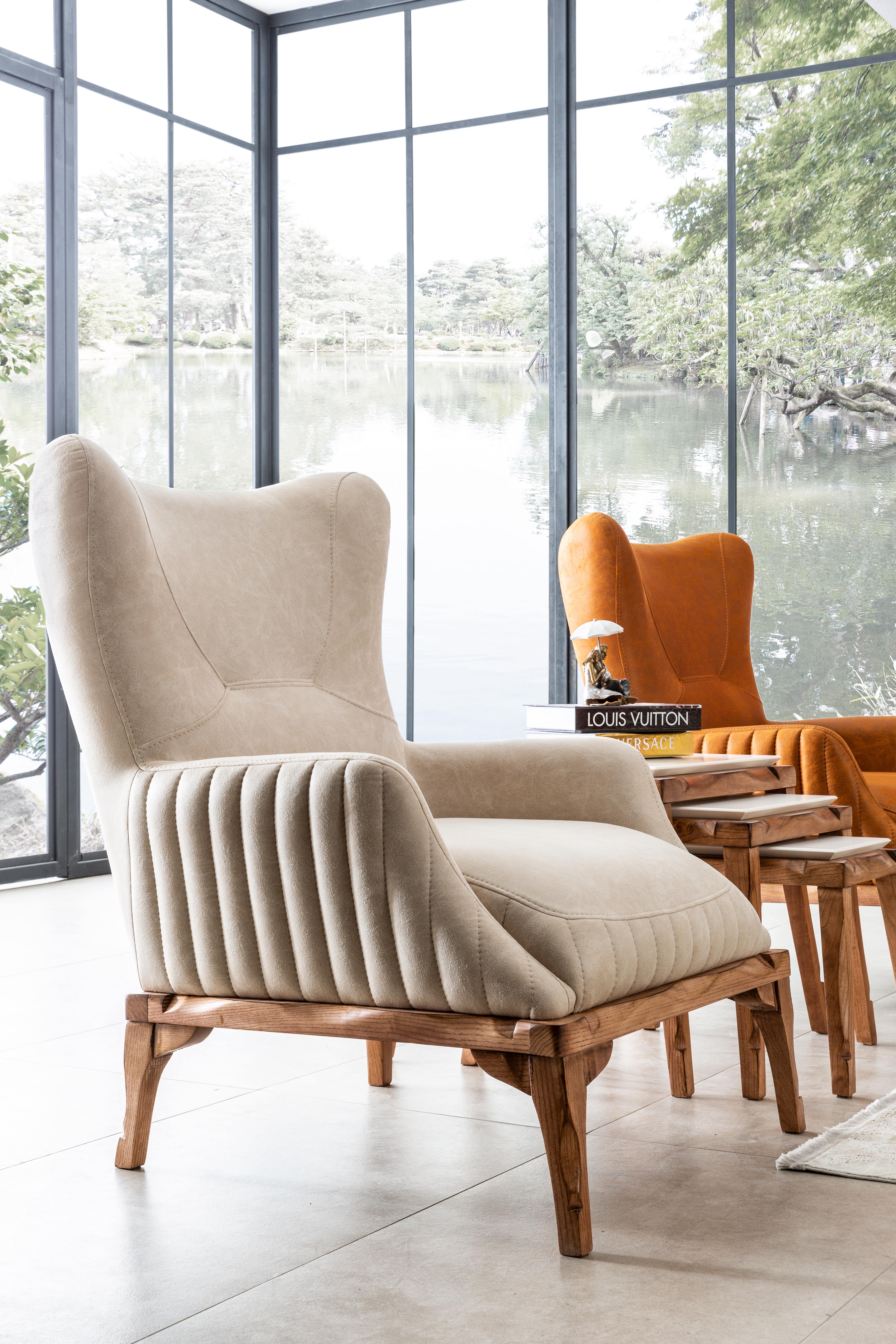 Netline Home Interior Tetra armchair with plush fabric upholstery and modern design, perfect for comfortable accent seating.
