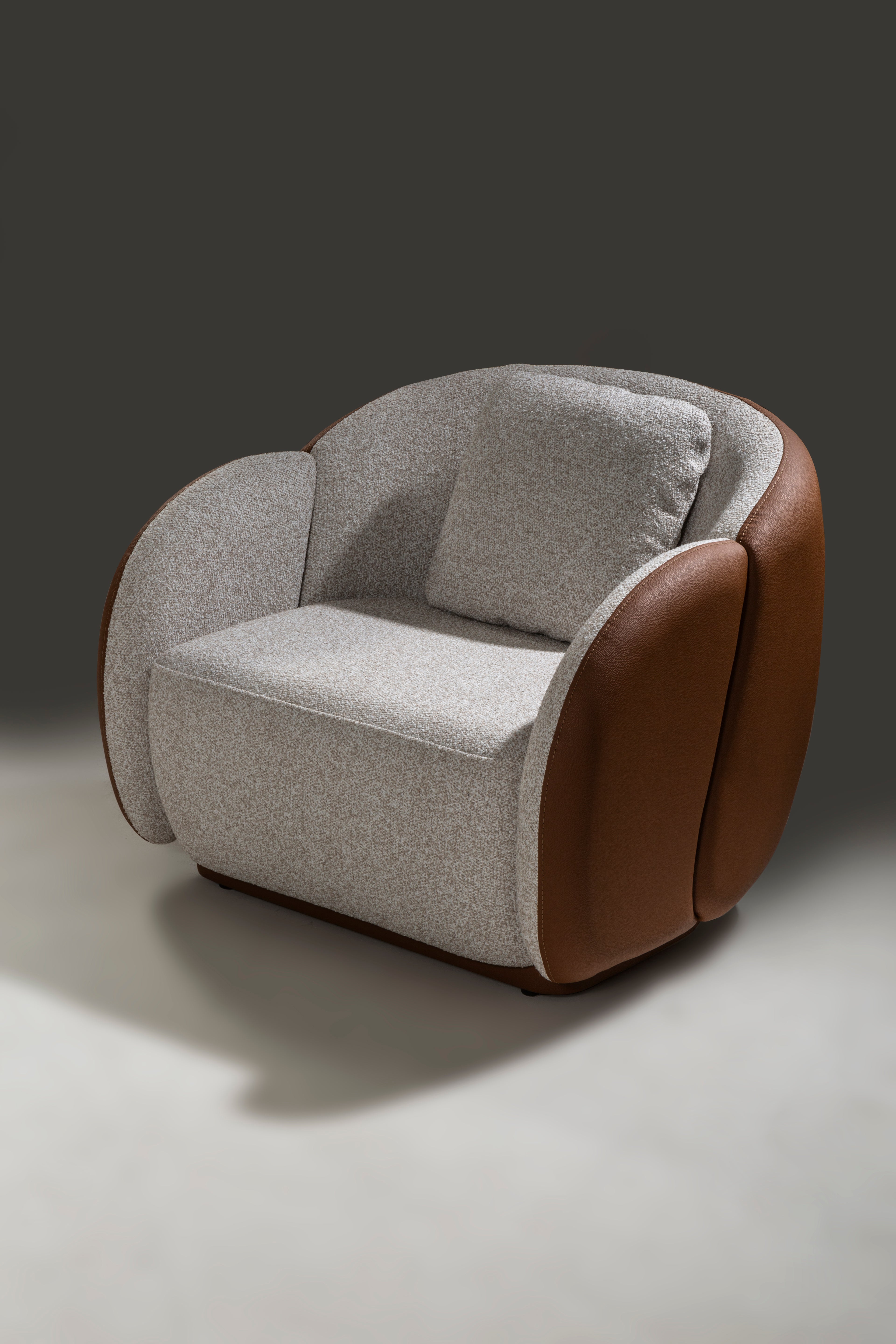 Comfortable Netline Home Interior Parma armchair with plush upholstery and modern design, perfect as an accent seating option.