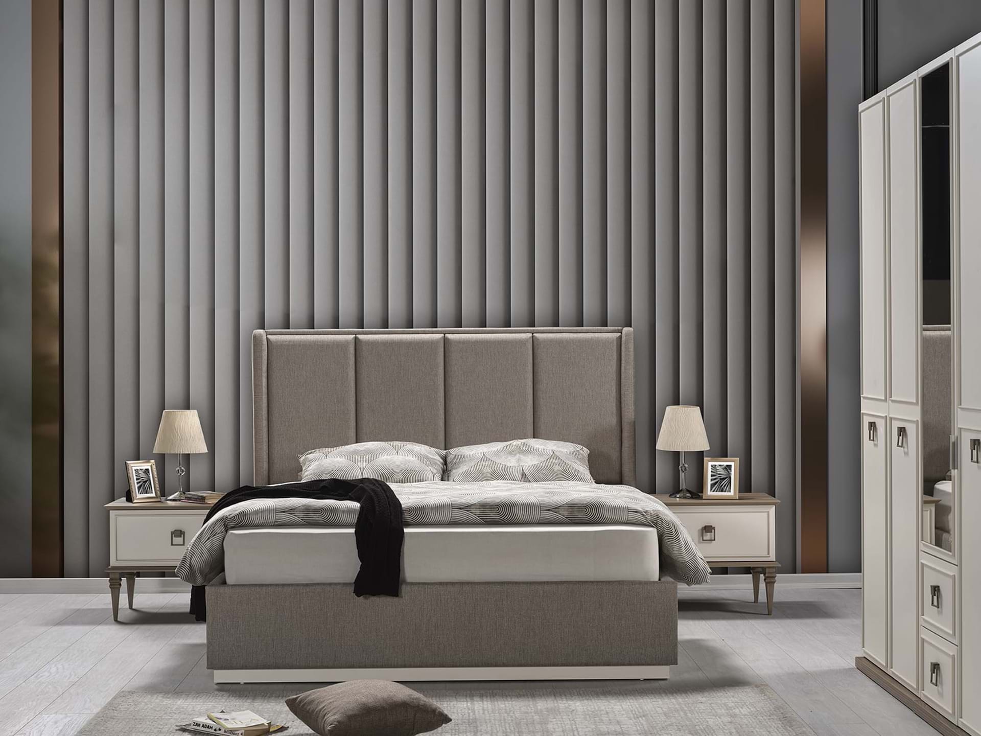 Modern Sahra bedroom furniture by Netline Home Interior, featuring a bed, bedside tables, and stylish decor elements.