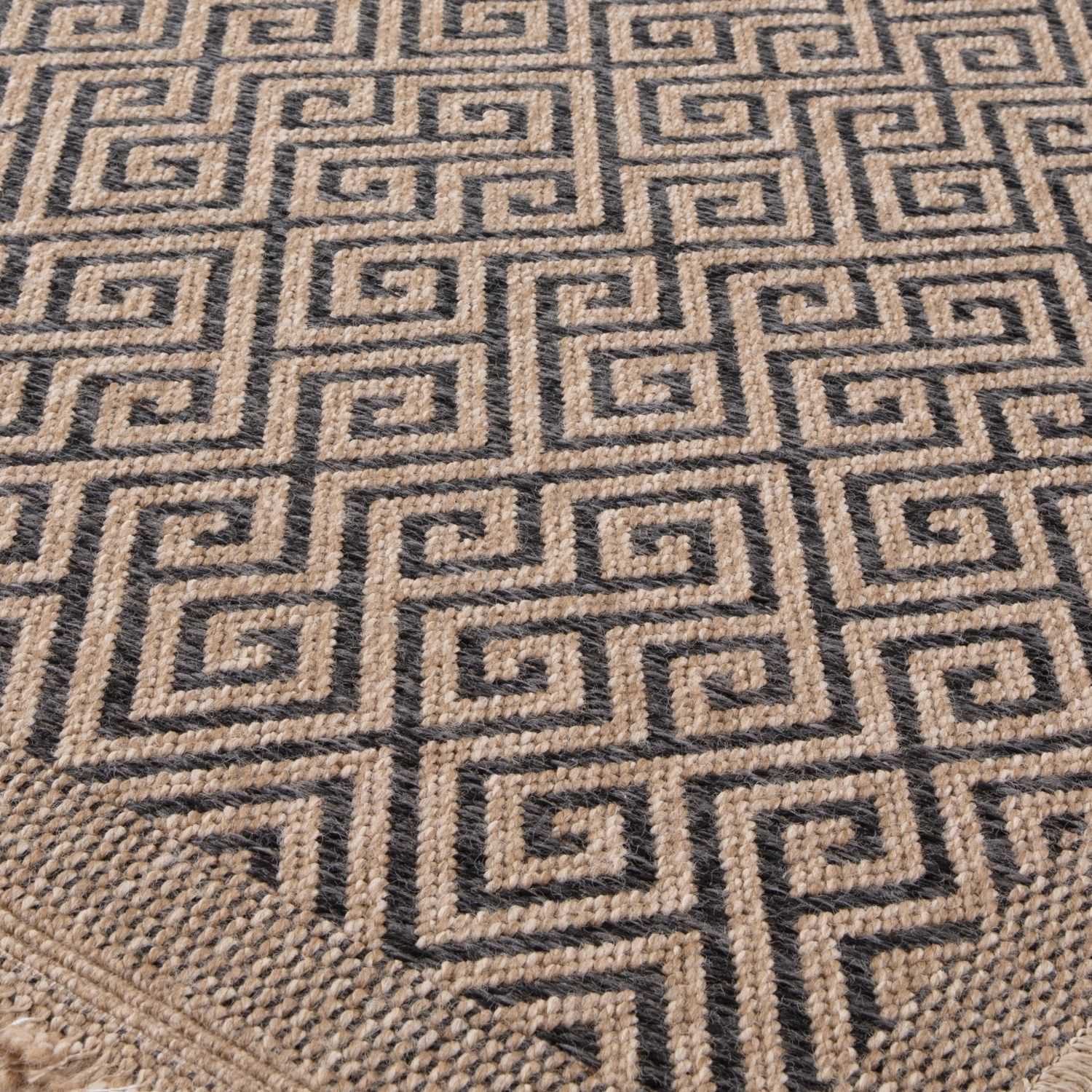 Dark grey Nature outdoor rug by The Rugs, showing textured fabric and durable design suitable for outdoor spaces.