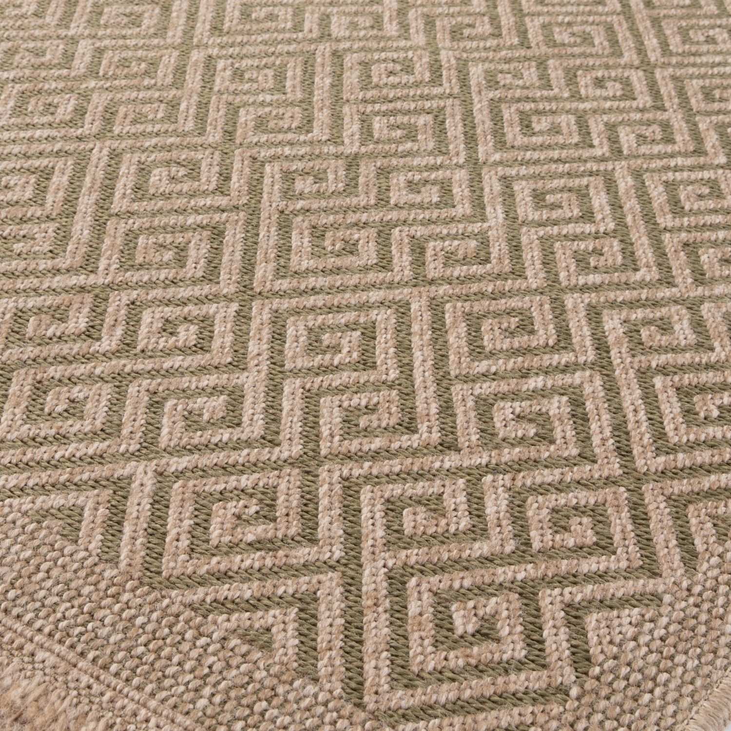 Green outdoor rug by The Rugs with a 5100G design, featuring natural patterns suitable for outdoor spaces.