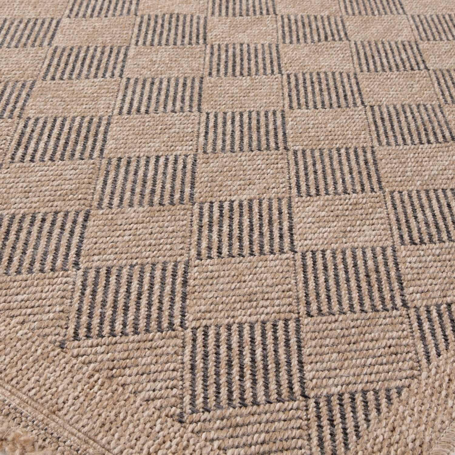 Dark grey outdoor rug from The Rugs' Nature Collection, featuring a durable design suitable for outdoor spaces.