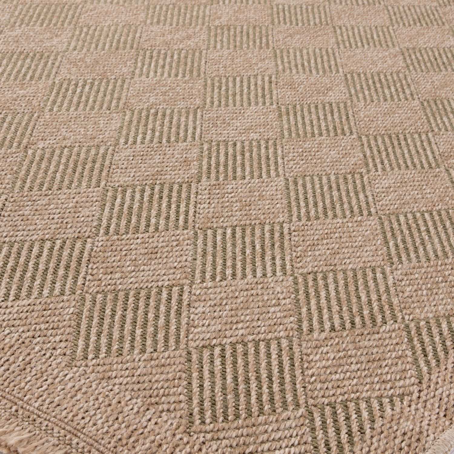 Green outdoor rug by The Rugs, 5300G Nature collection, showcasing durable woven design suitable for outdoor spaces.