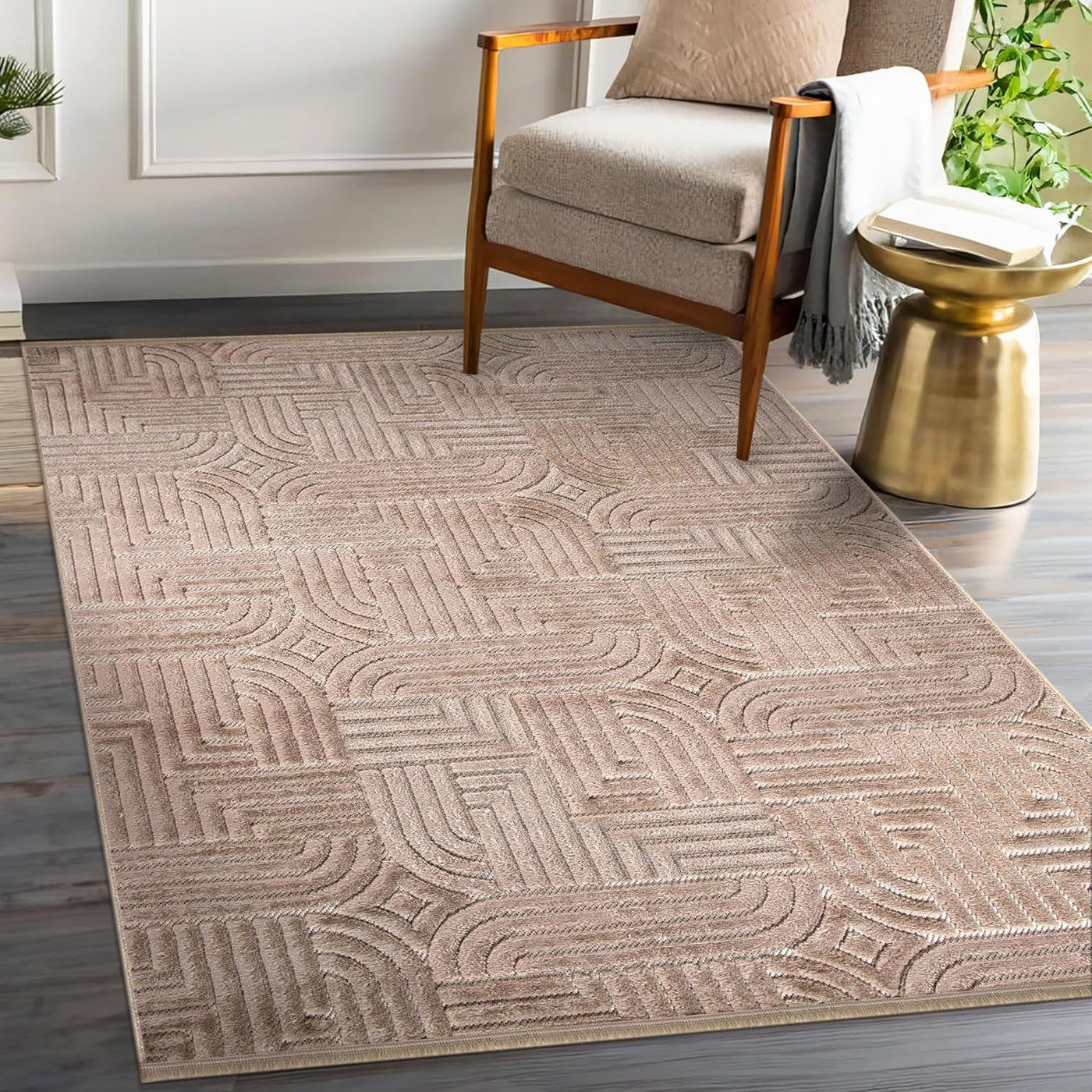 Modern textured polypropylene area rug in taupe with geometric pattern, suitable for living room, bedroom, or dining space.