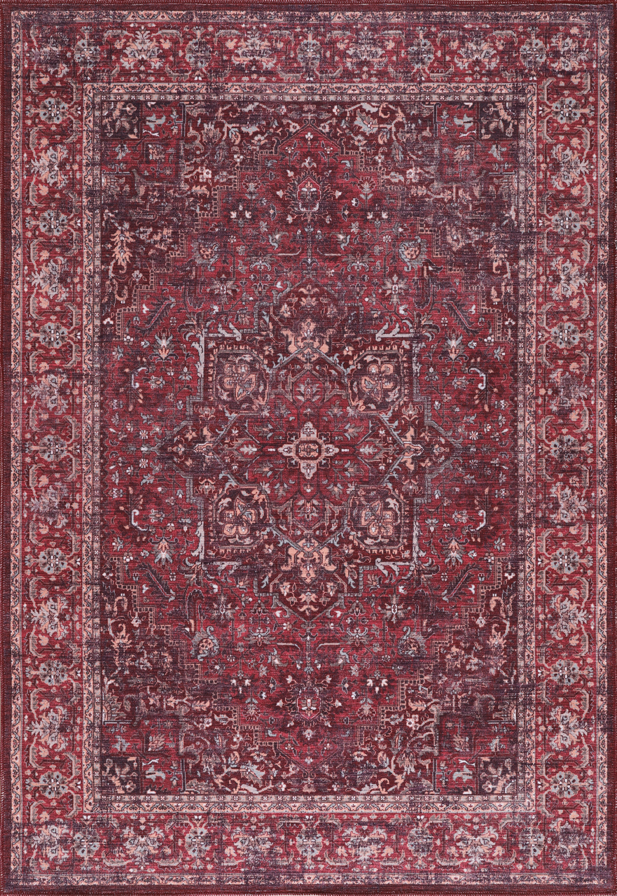 Multicolor geometric washable rug by Netline Home featuring tribal patterns in vibrant shades on a neutral background.