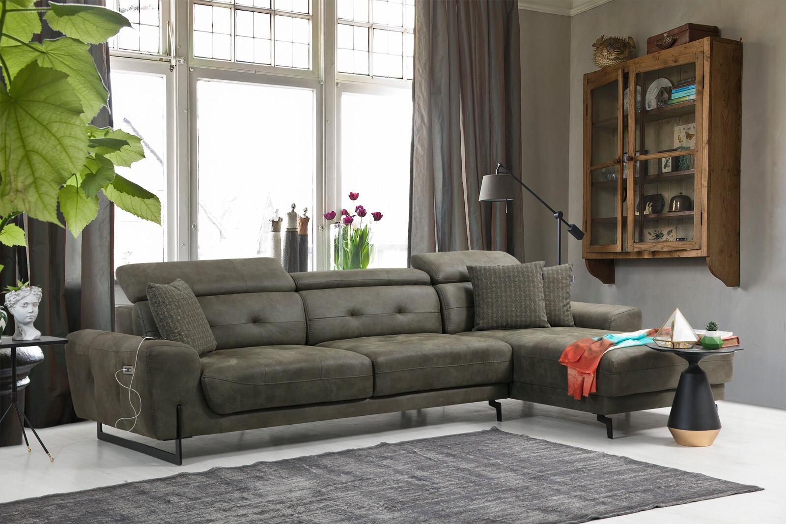 Lora Relax Mini L corner recliner sofa by Netline Home Interior, featuring plush cushions and fabric upholstery in a modern living room setting.