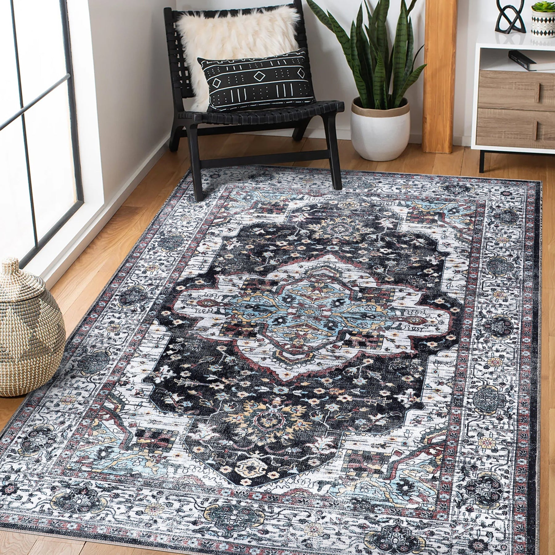 Machine washable Persian medallion rug by Netline Home featuring vintage black, white, and blue accents for living room or bedroom.