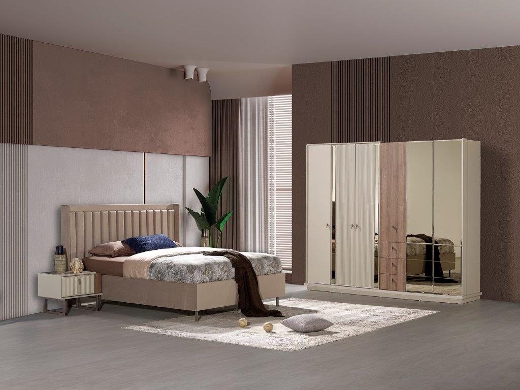 Valente bedroom furniture by Netline Home Interior featuring a cozy bed with neutral bedding and modern design elements.