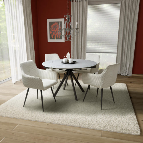 Netline Home Interior Rotana extending round dining table with matching chairs, stylish family dining furniture in a modern setting.