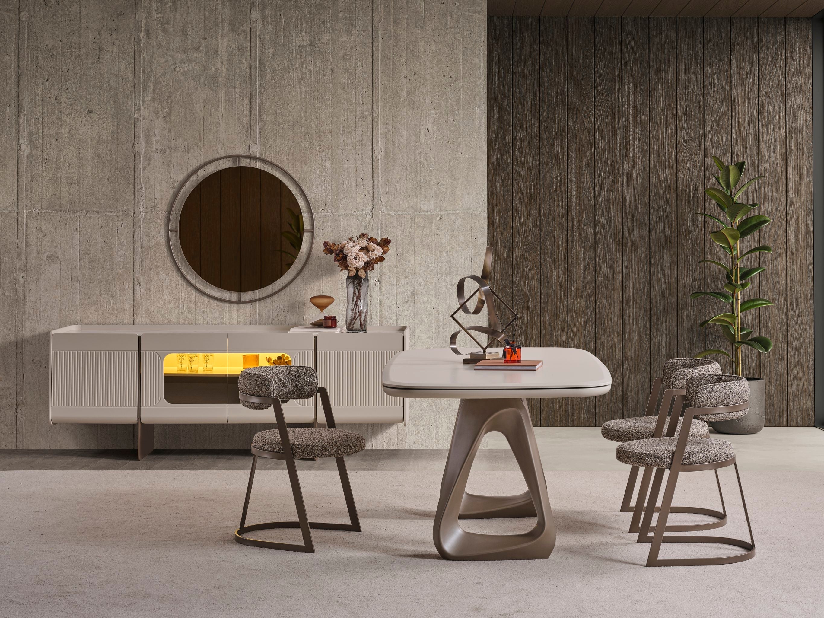 Luna dining table with four matching chairs in a modern design, crafted by Netline Home Interior for stylish family dining spaces.