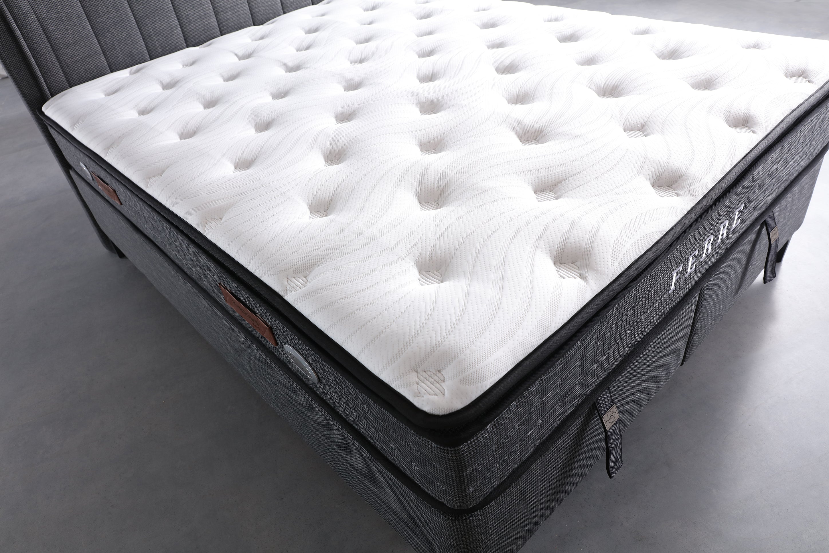Netline Home Interior Ferre mattress featuring supportive sleep comfort, with plush fabric and a sturdy, high-quality mattress design.