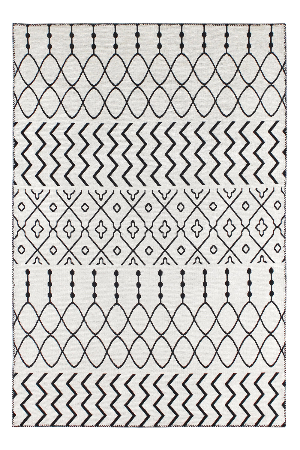 Black and cream washable tribal geometric rug by Netline Home, soft chenille carpet with cotton backing for cozy decor.