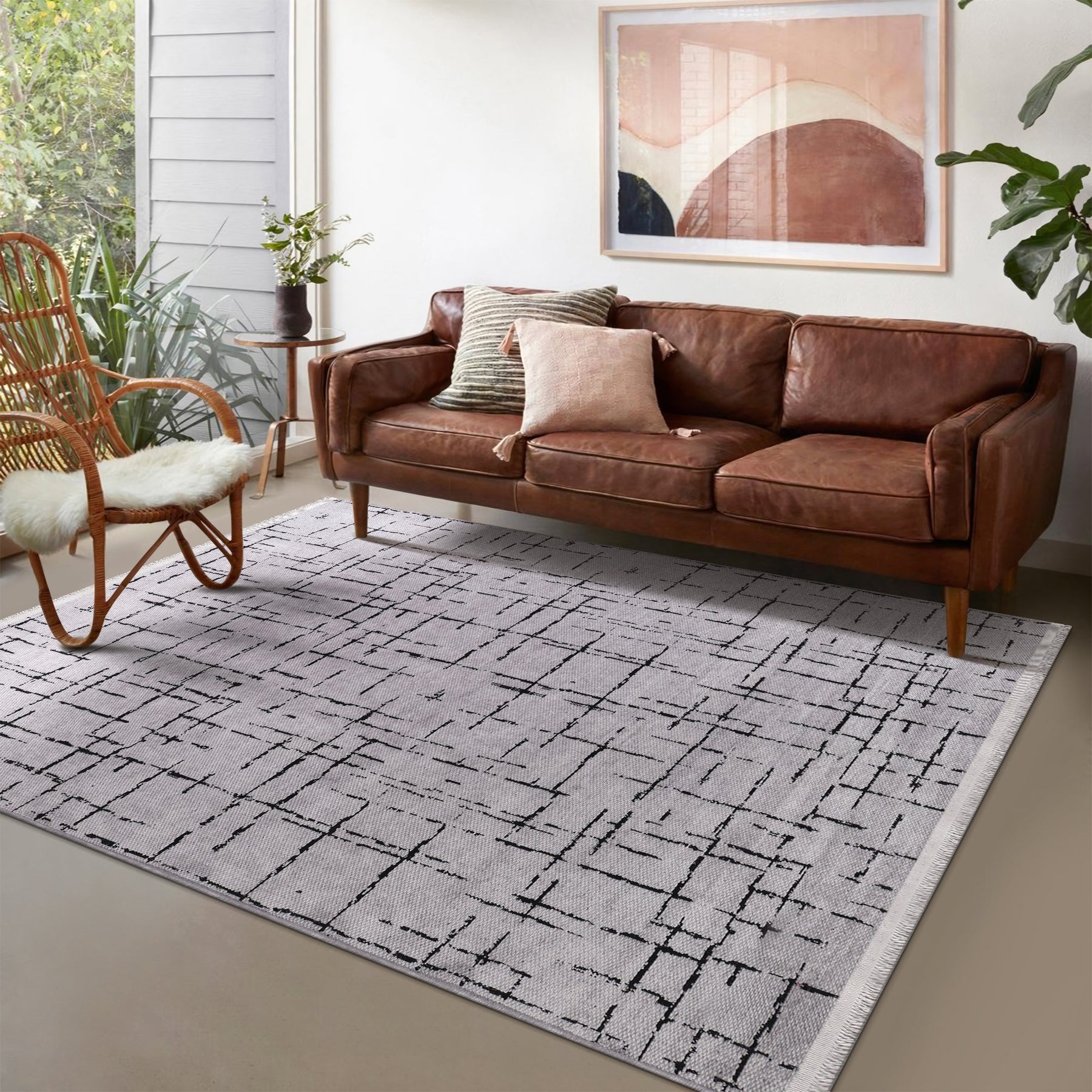 Gray machine washable rug by Netline Home featuring soft chenille texture, perfect for easy cleaning and cozy decor.