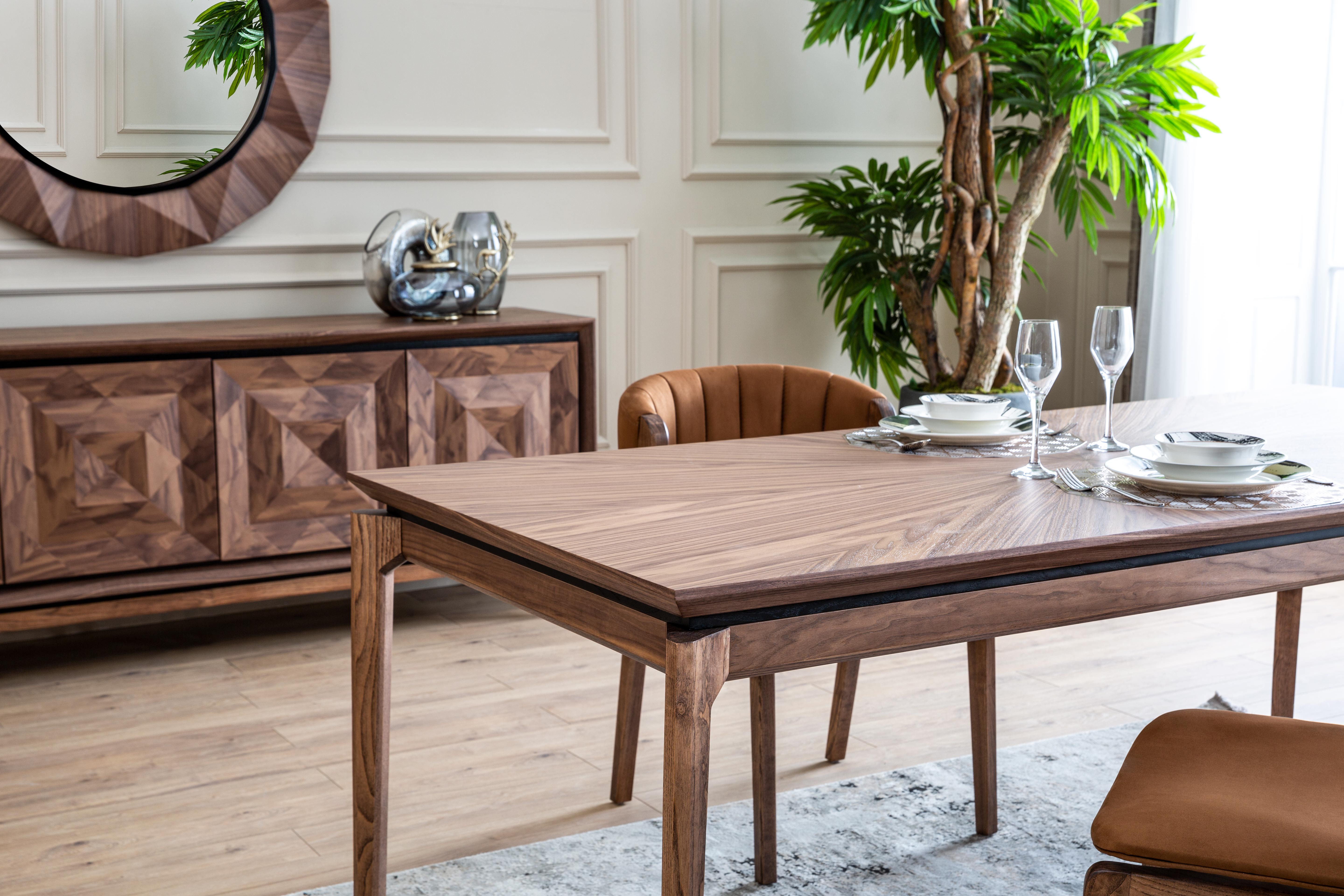 Modern Maserati dining table by Netline Home Interior, featuring sleek design and sturdy table surface for contemporary dining rooms.