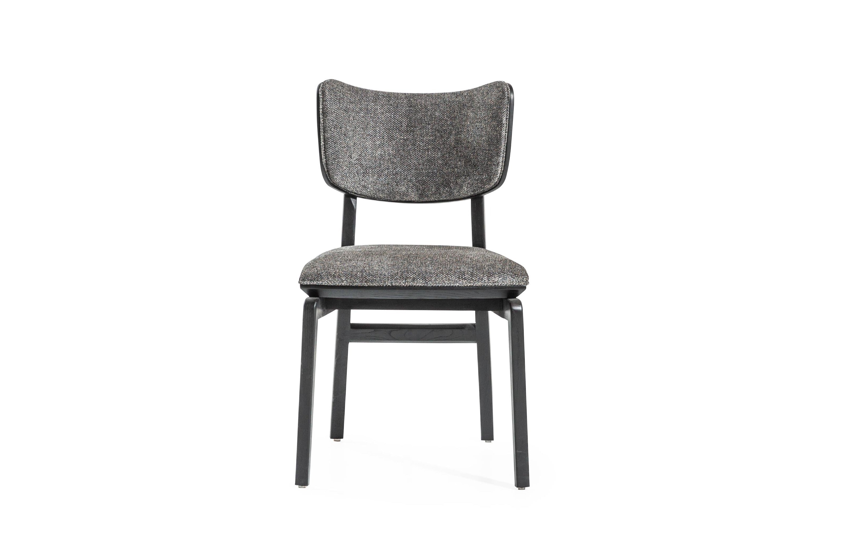 Netline Home Interior Panamera Dining Chair with cushioned seat and wooden legs, designed for comfortable everyday dining.