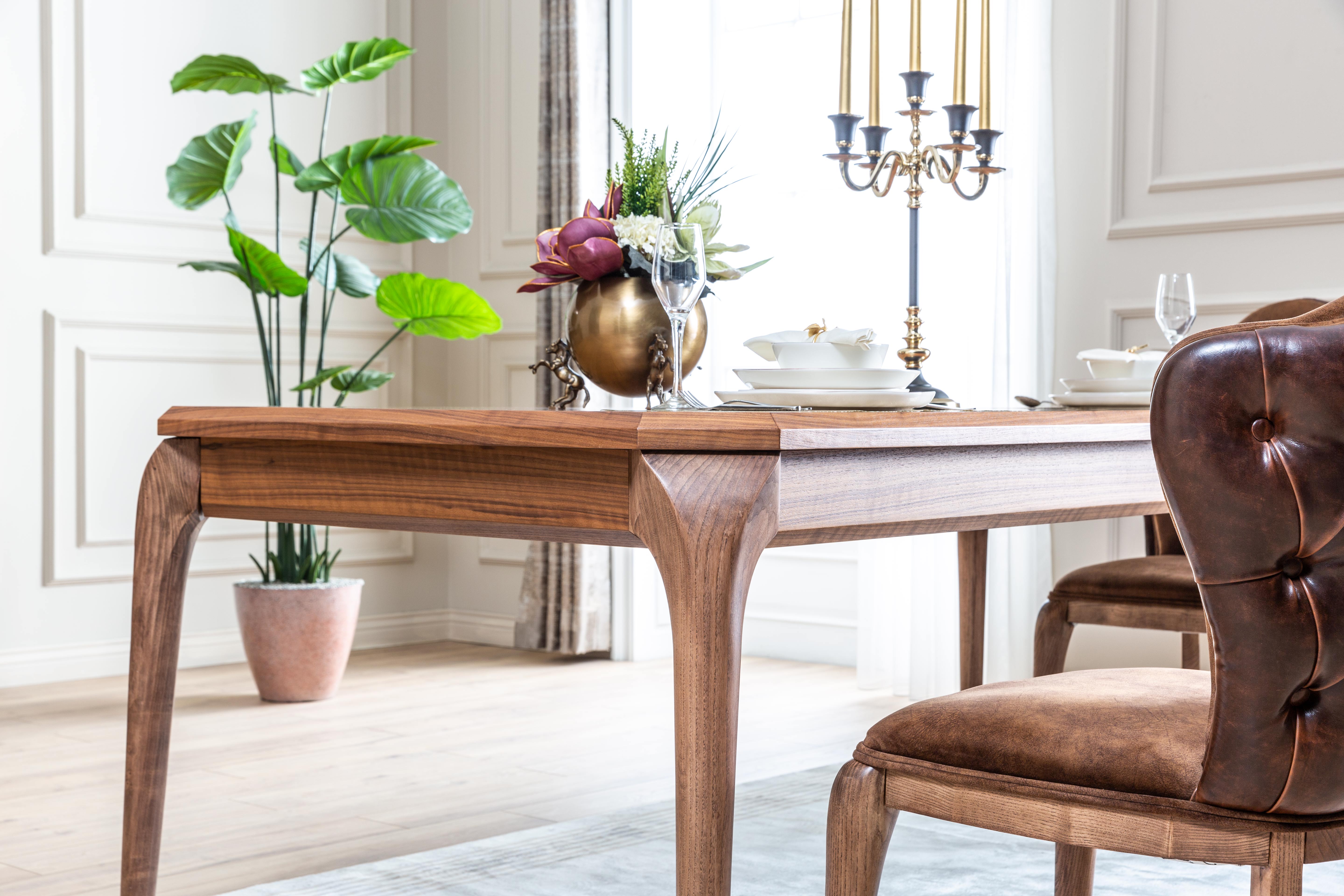 Modern Lotus dining room set by Netline Home Interior with a sleek table and matching chairs for contemporary entertaining.