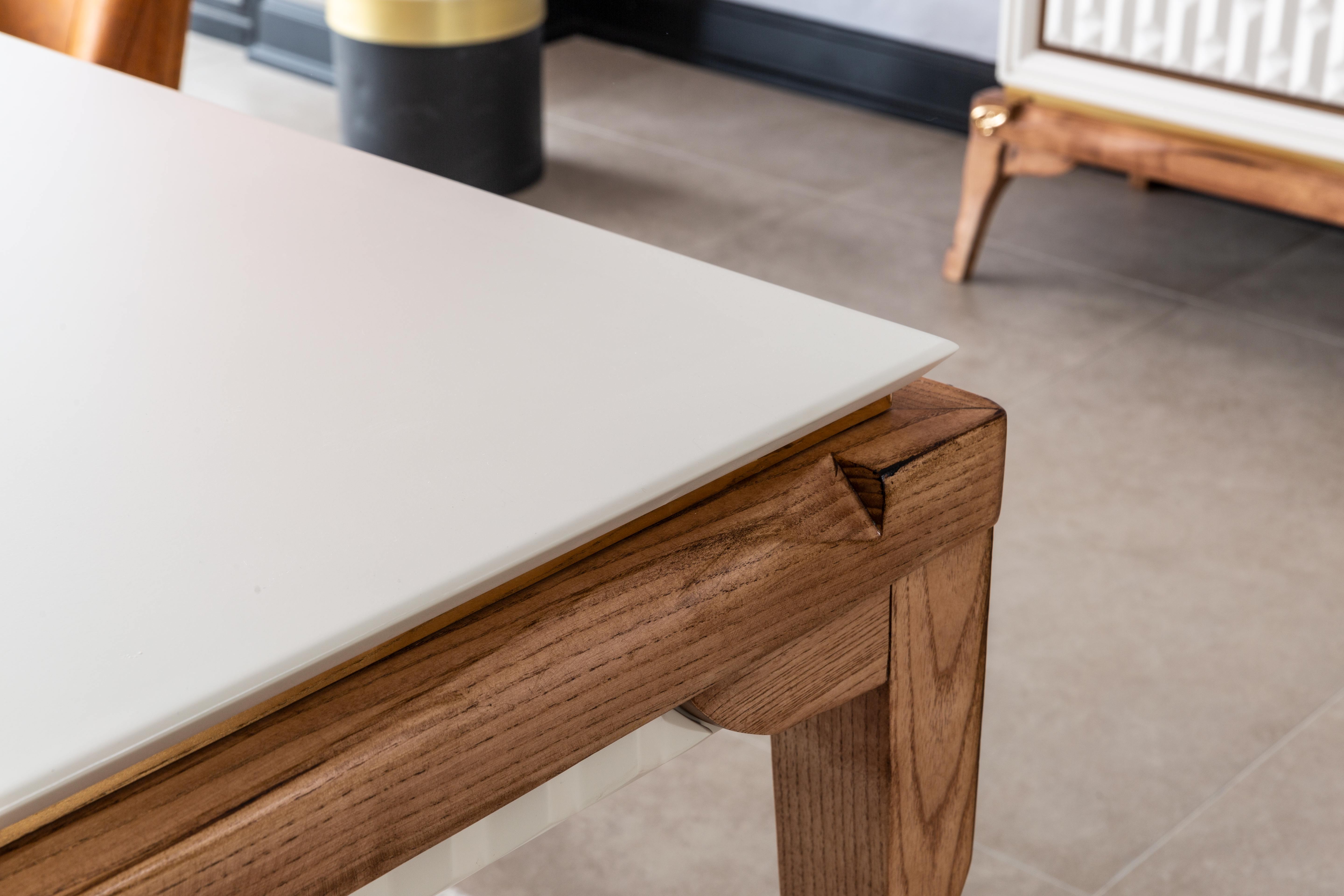 Modern Tetra dining table by Netline Home Interior with sleek design and wooden finish, suitable for contemporary dining rooms.