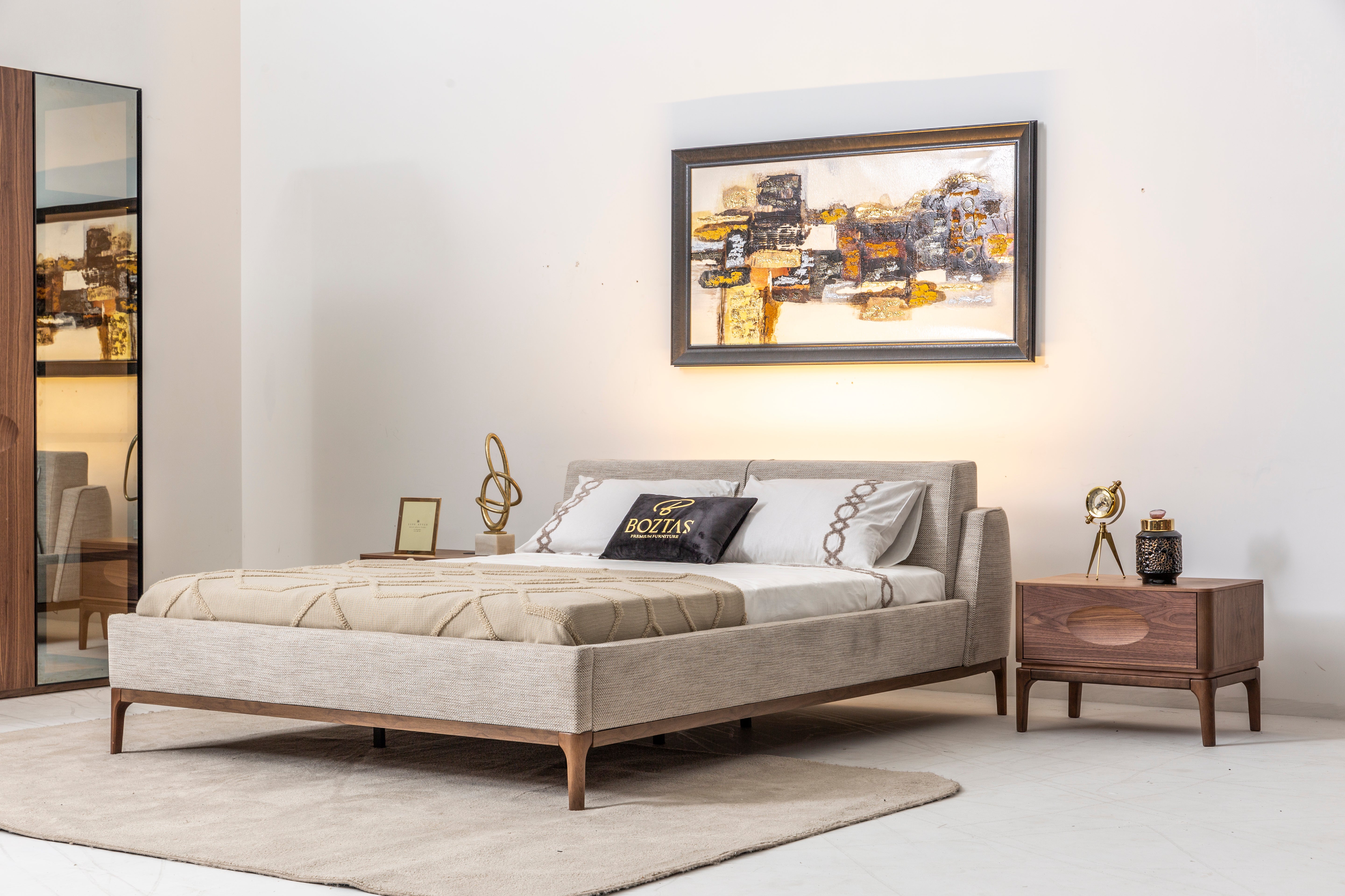 Netline Home Interior Aston bedroom set featuring a modern bed frame, matching nightstands, and a stylish wardrobe in a contemporary bedroom.