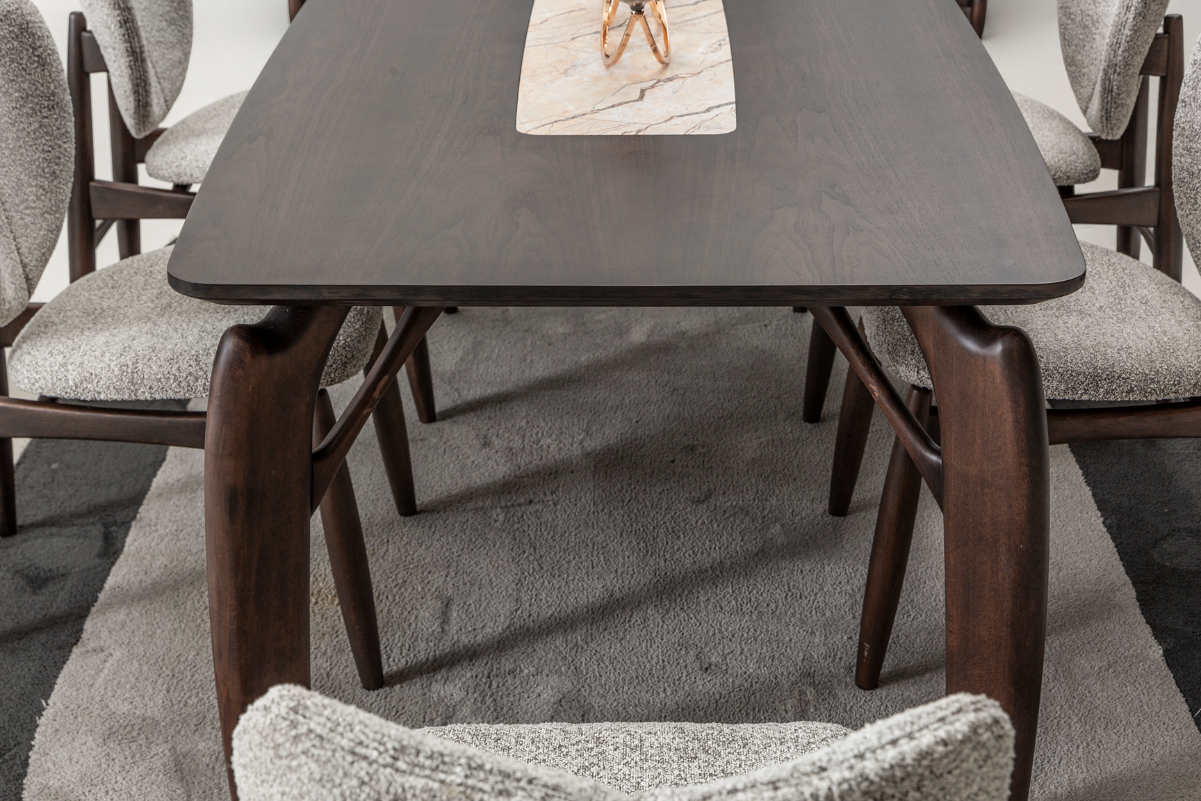 Modern Camaro dining table with matching chairs from Netline Home Interior, stylish dining room set for contemporary entertaining.