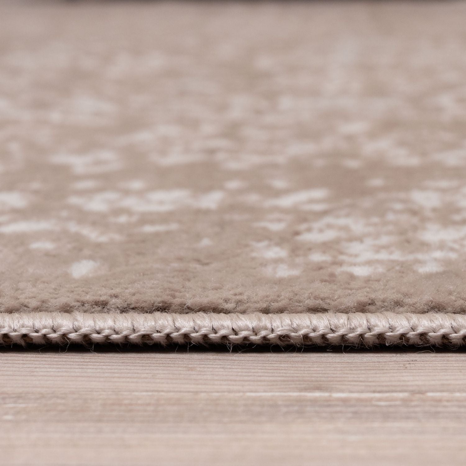 Montana Beige Rug by The Rugs, showcasing a soft, textured beige surface with intricate woven patterns.