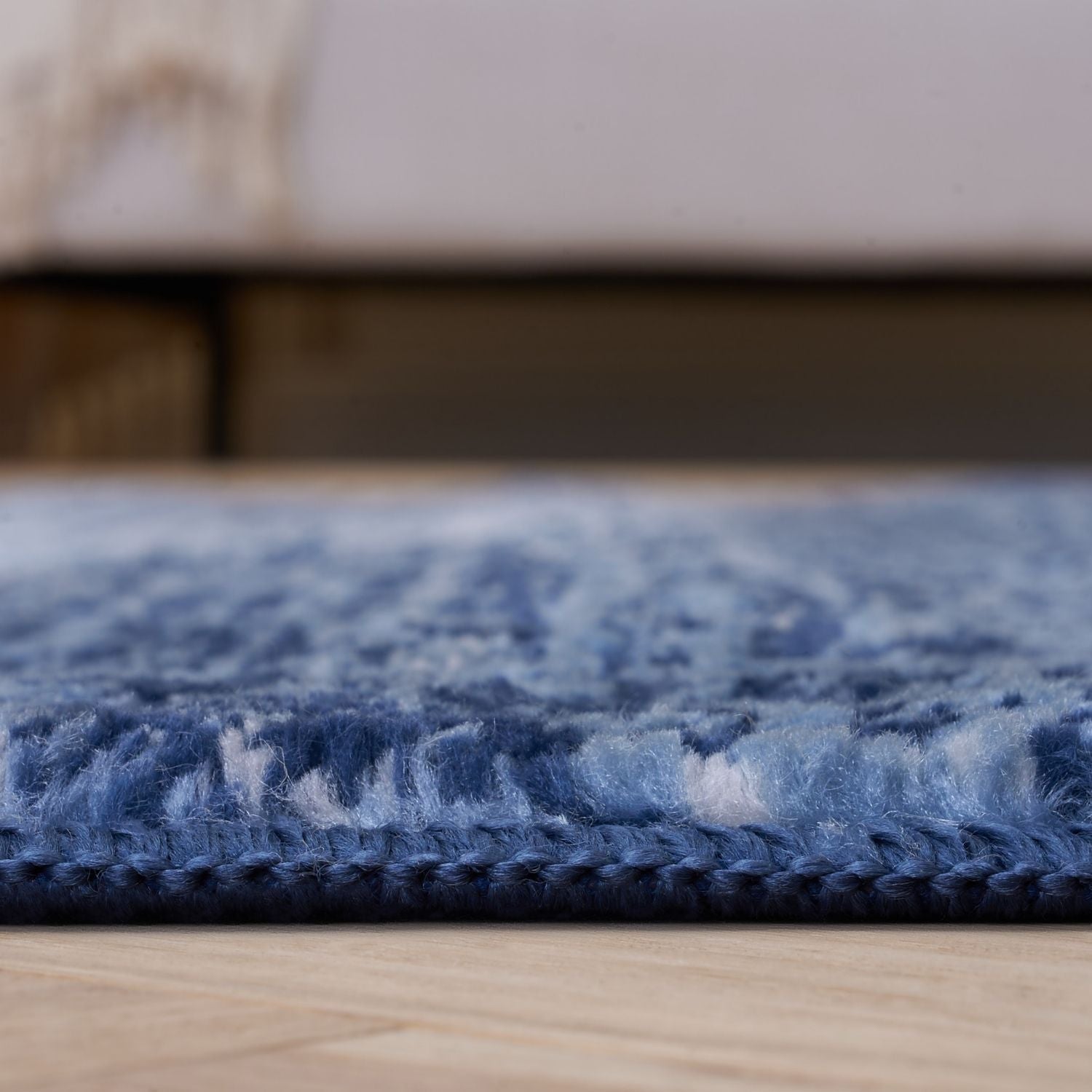 Montana Blue Rug by The Rugs, navy-colored plush pile rug with intricate pattern, ideal for cozy living spaces.