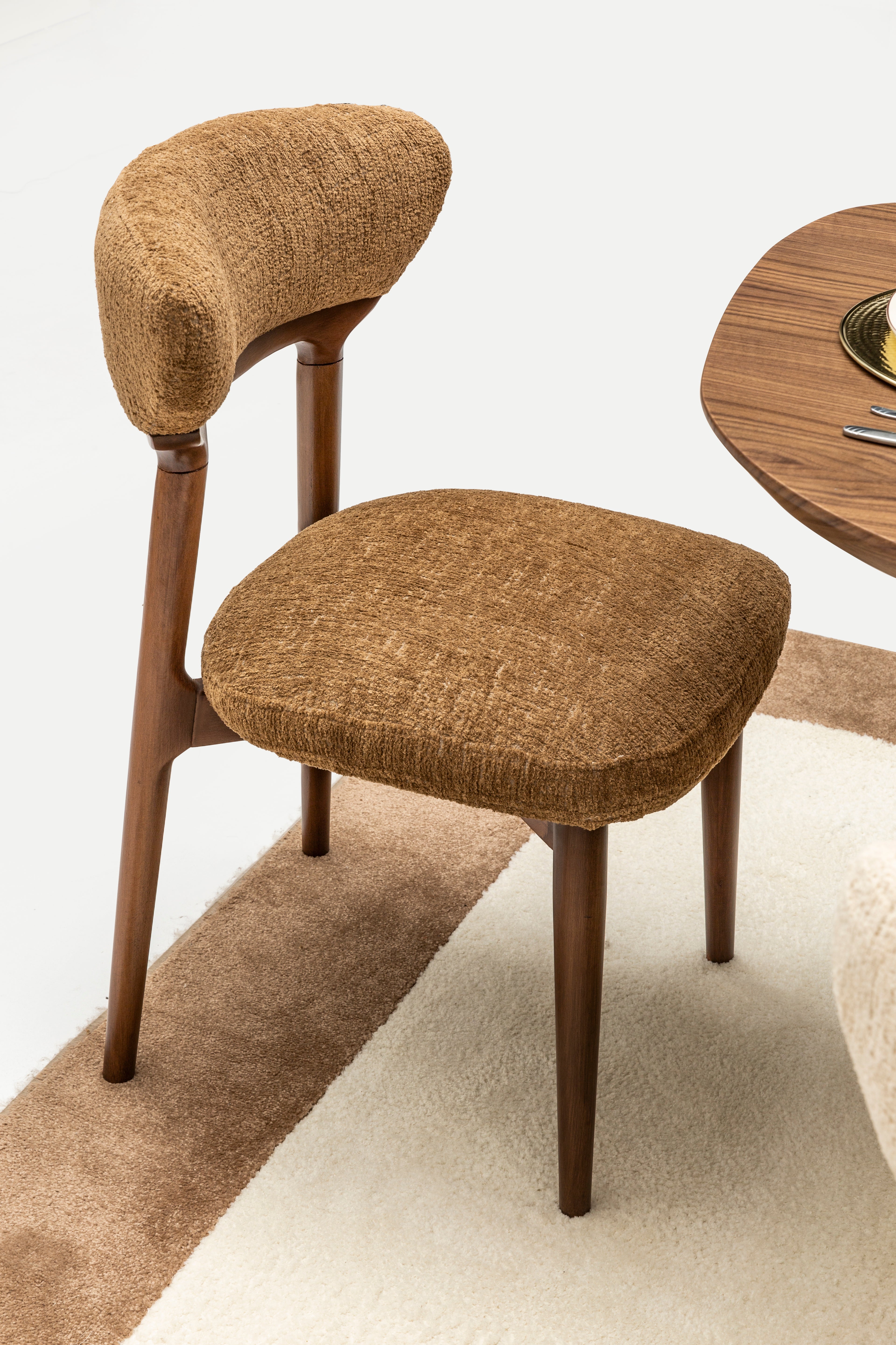 Netline Home Interior Rolex dining room furniture with elegant wooden table and matching chairs in a modern interior setting