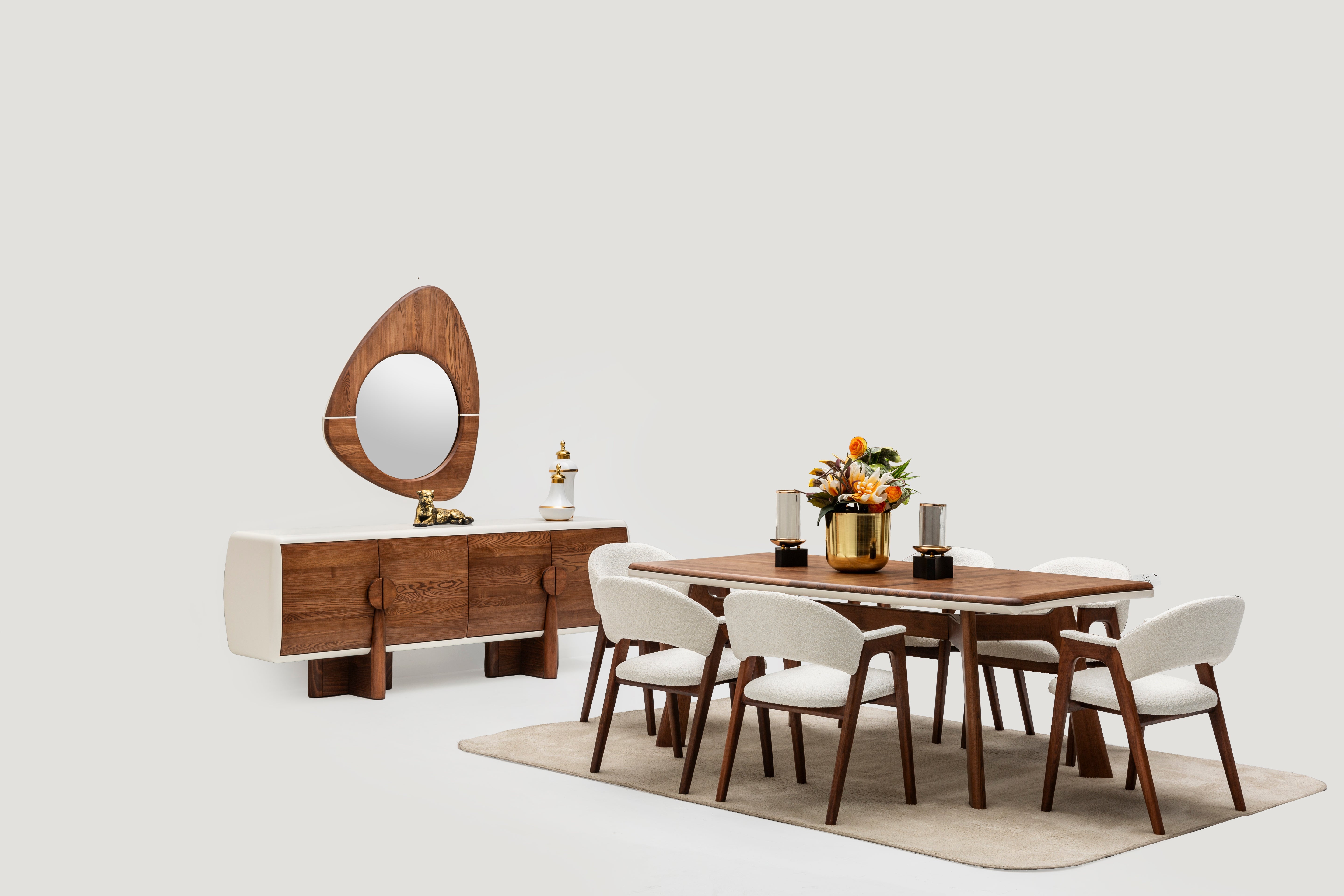 Corvette dining table with four matching chairs from Netline Home Interior, stylish family dining set in a modern design.