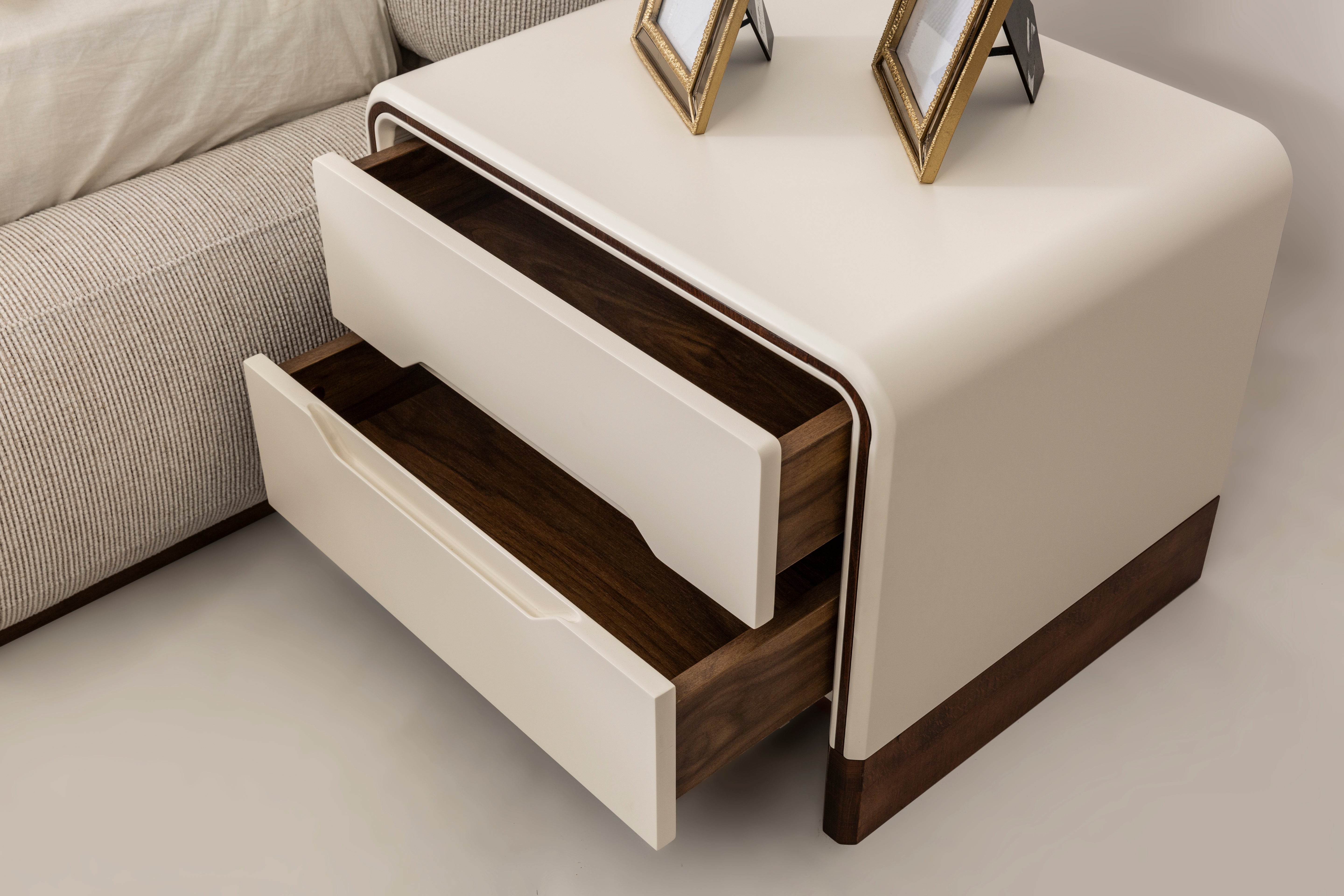 Netline Home Interior Cadillac bedroom set with bed, nightstands, and dresser in a stylish bedroom arrangement.
