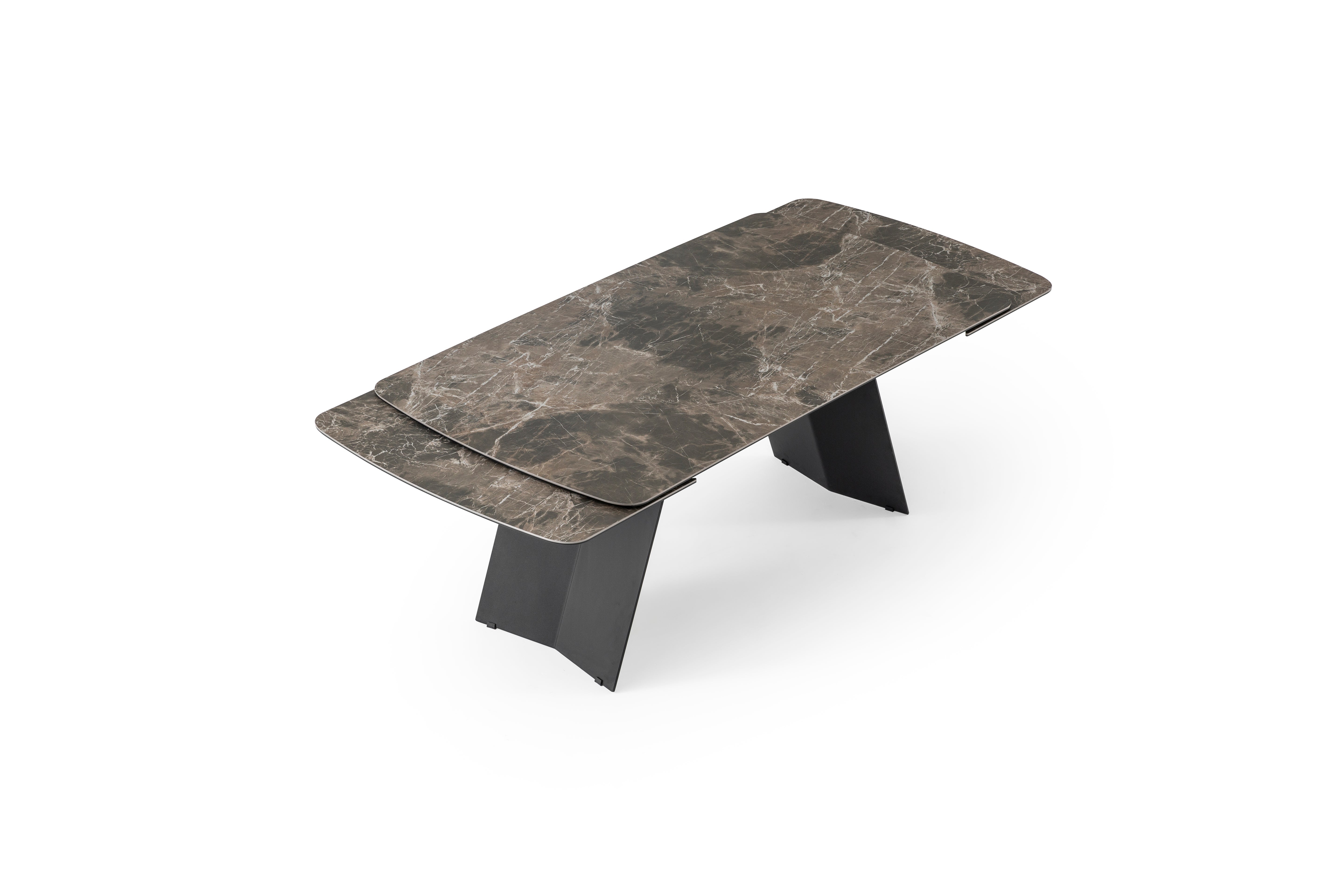 Modern Volare dining table by Netline Home Interior with sleek wooden surface and sturdy metal legs for contemporary dining spaces.