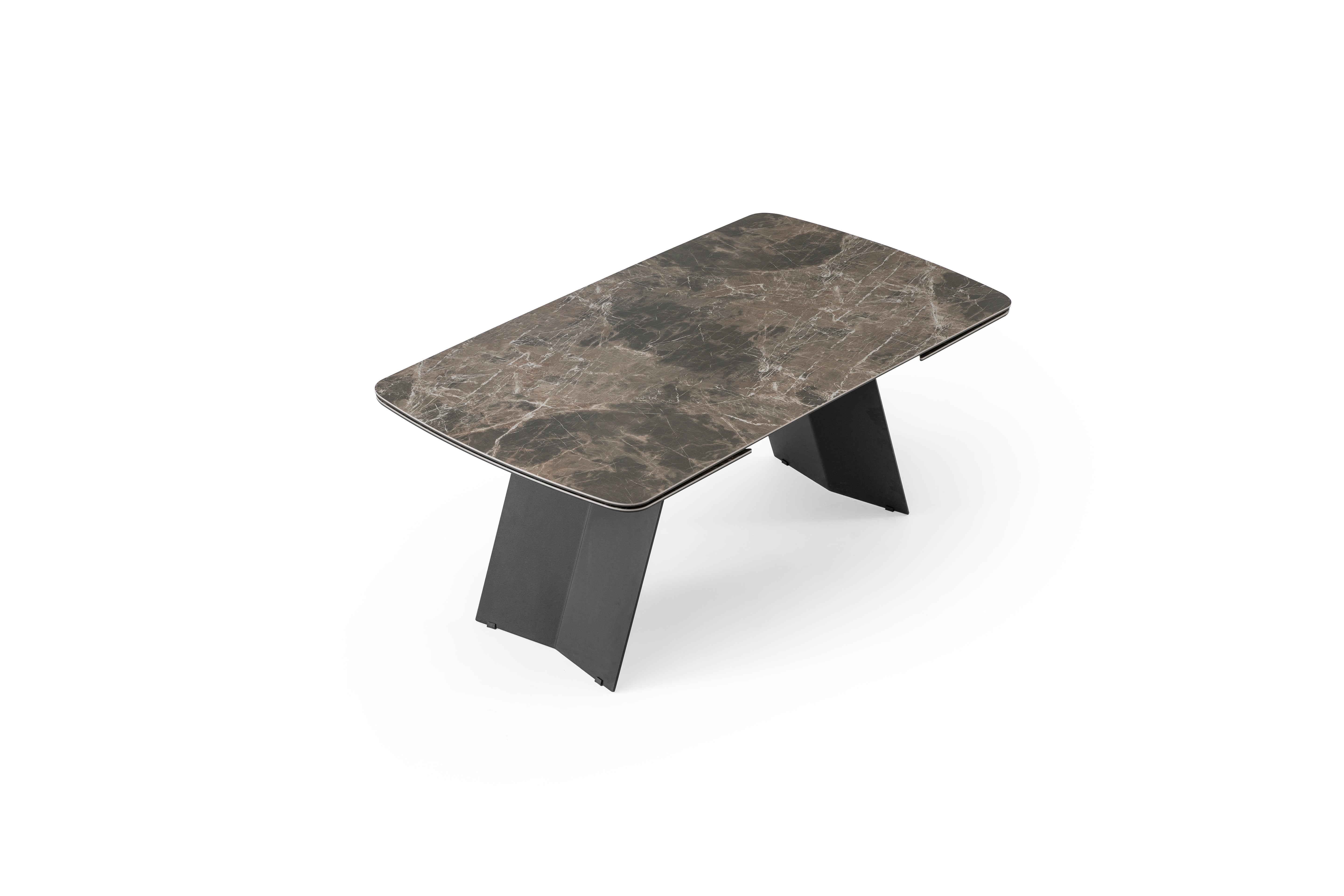 Modern Volare dining table by Netline Home Interior with sleek wooden surface and sturdy legs for contemporary dining spaces.
