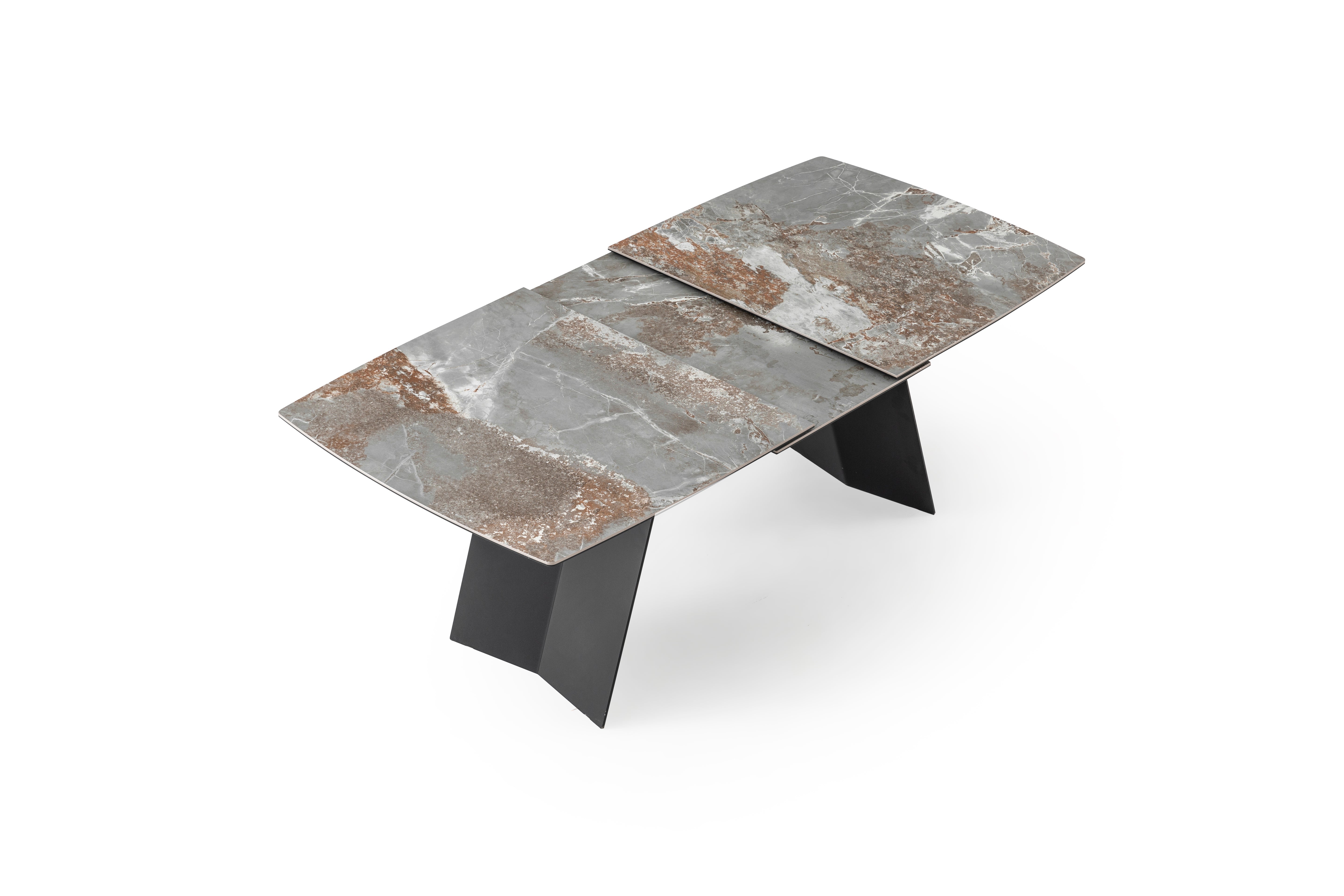 Modern Vento dining table by Netline Home Interior with a sleek wooden surface and minimalist design for contemporary dining spaces.
