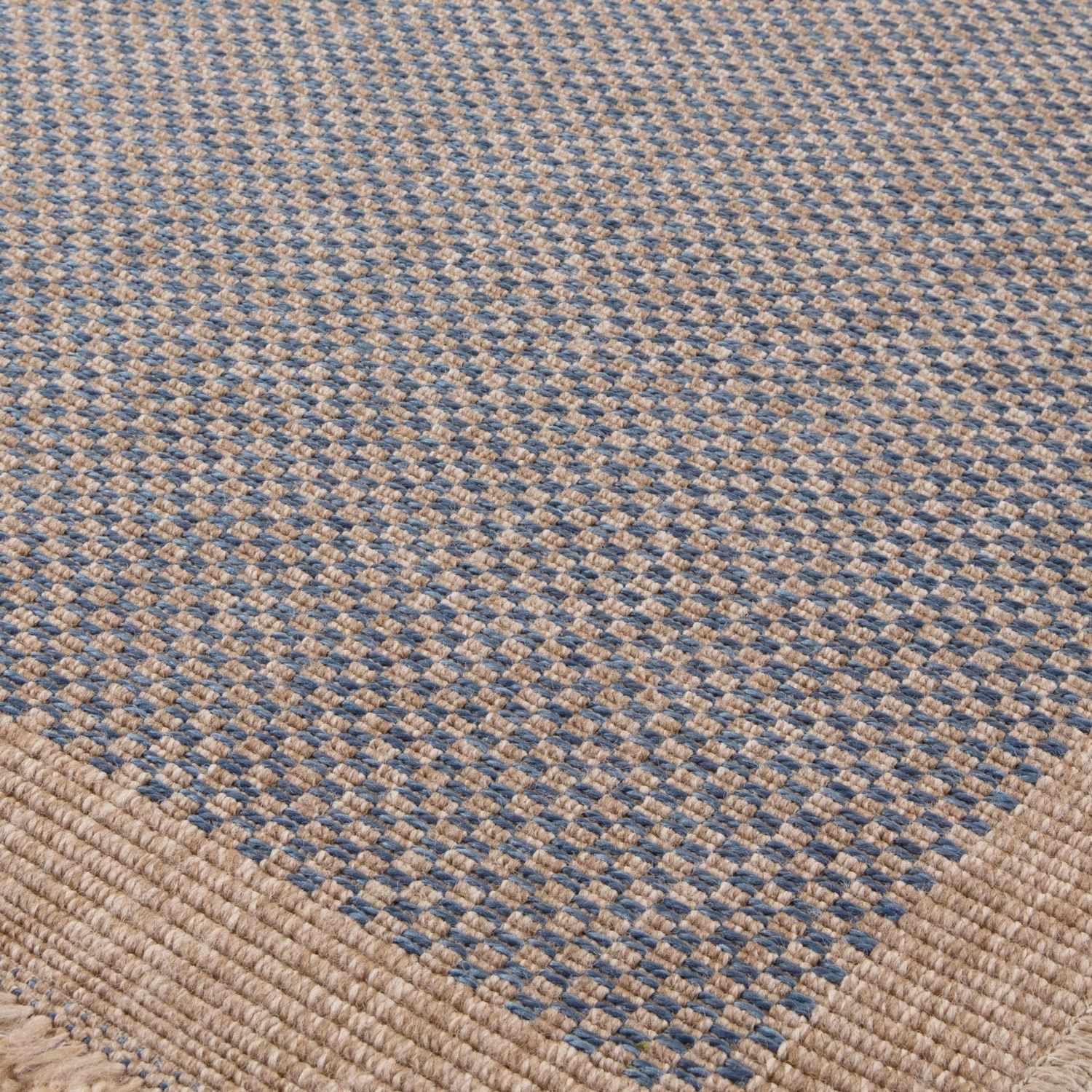 Blue outdoor rug from The Rugs' Nature collection, featuring a textured design suitable for patio or garden spaces.