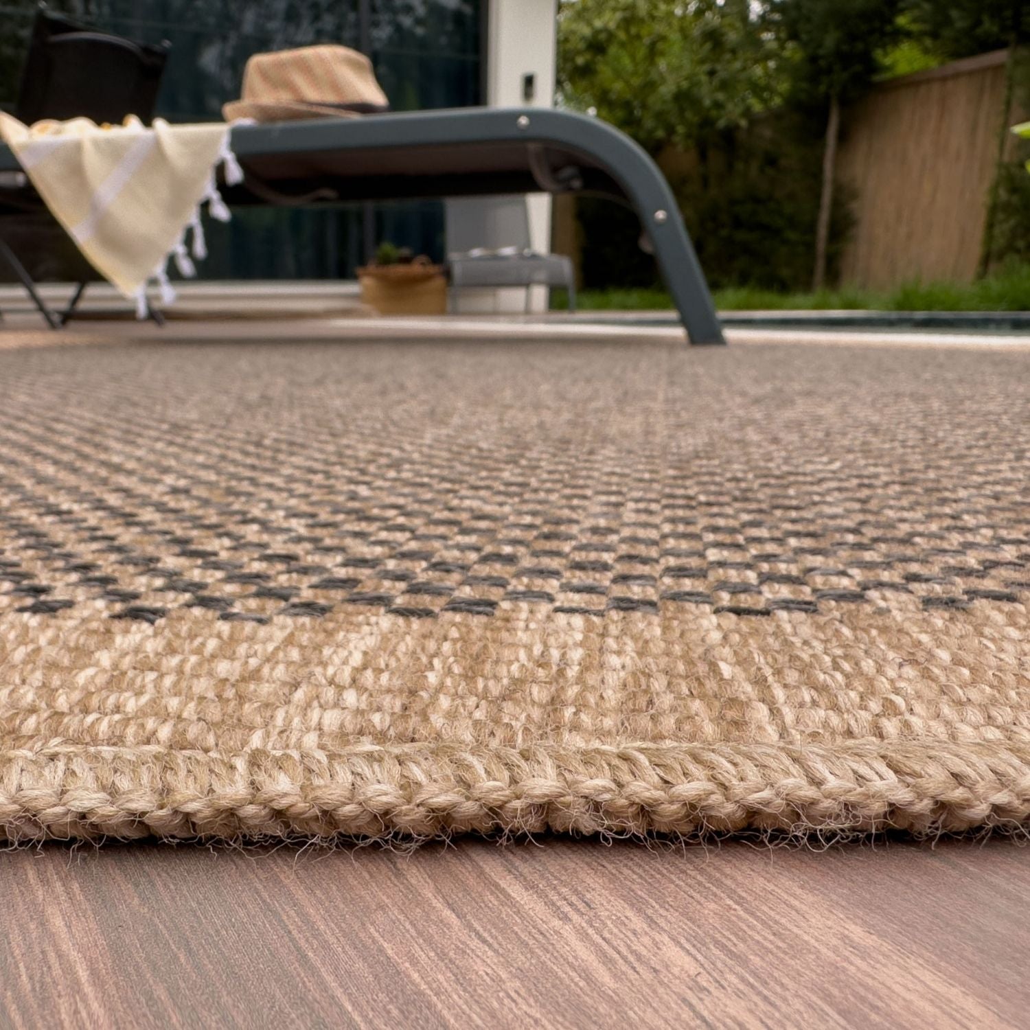 Dark grey outdoor rug from The Rugs' Nature collection, featuring a durable, textured design for outdoor living spaces.