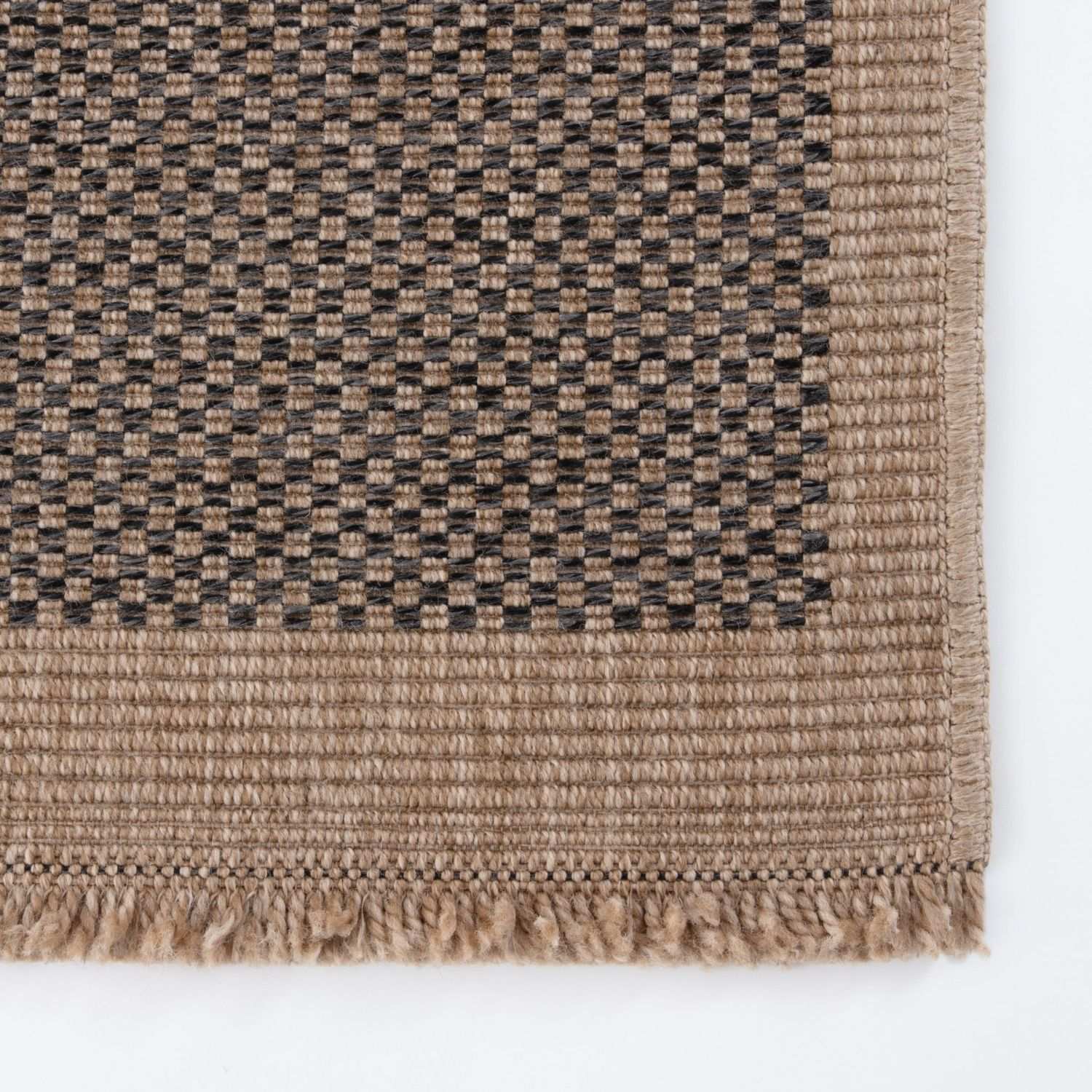 Dark grey outdoor rug by The Rugs, Nature Outdoor Rug 5200DG, showcasing textured fabric suitable for patio or garden use.