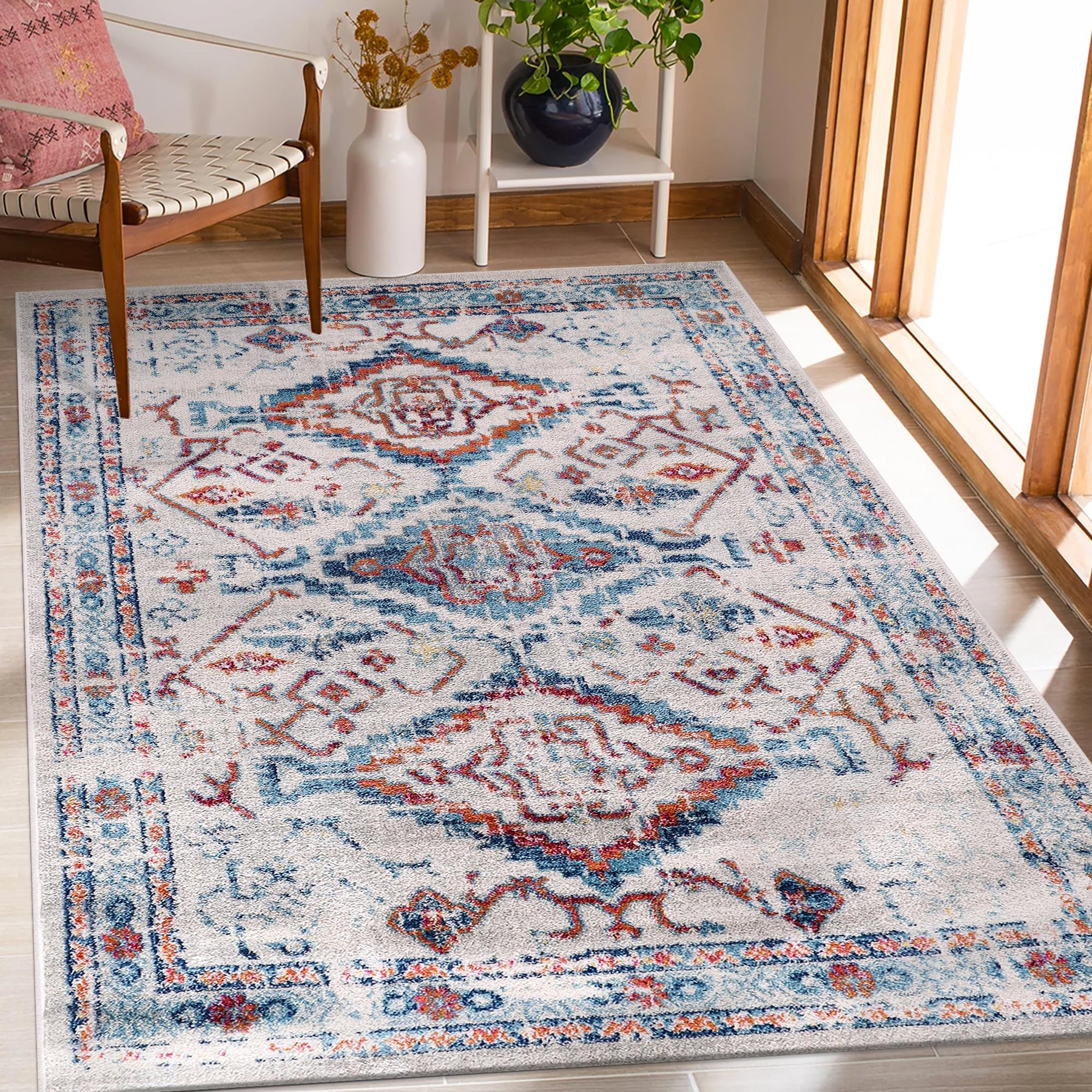 Cream and blue traditional oriental rug with soft medium pile, stain-resistant, suitable for living room, bedroom, or dining area.