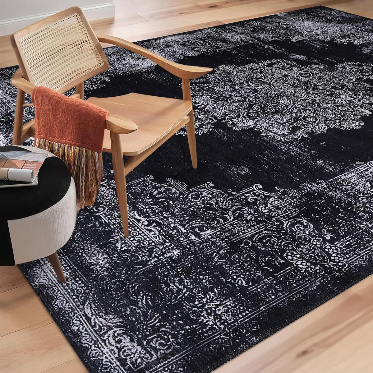 Black and gray medallion washable rug by Netline Home featuring a traditional kilim design with intricate patterns.