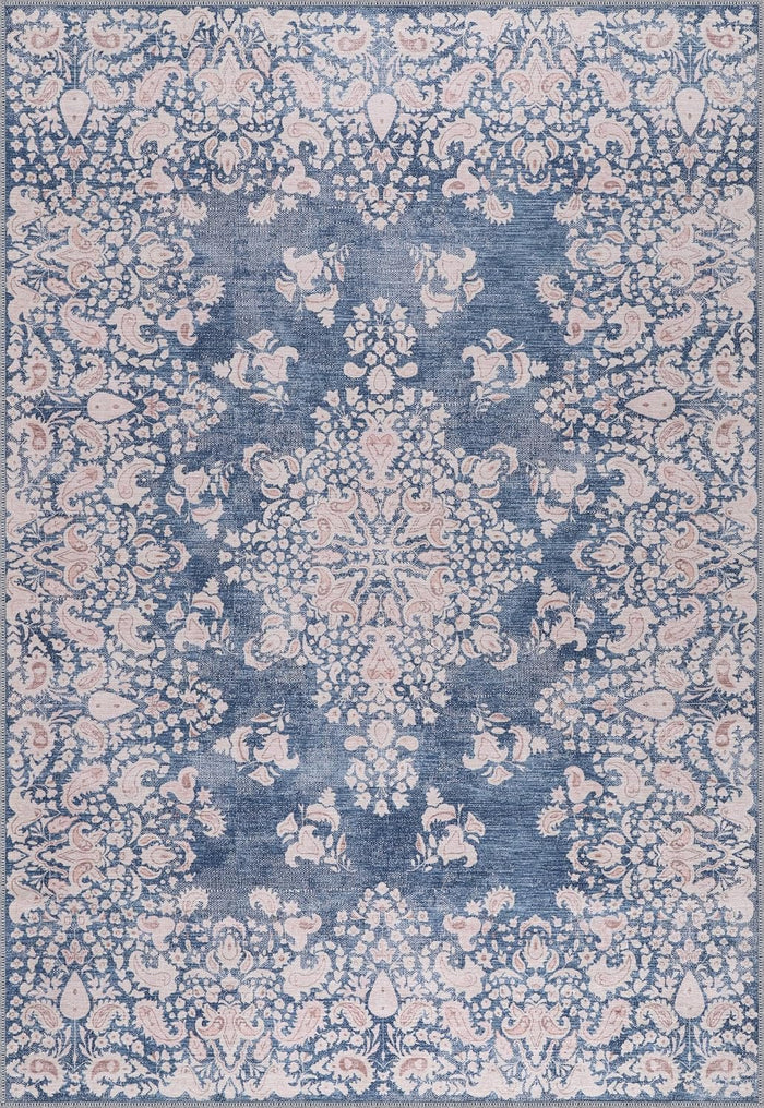 Blue Vintage Low Pile Washable Rug shown in an illustrative room
