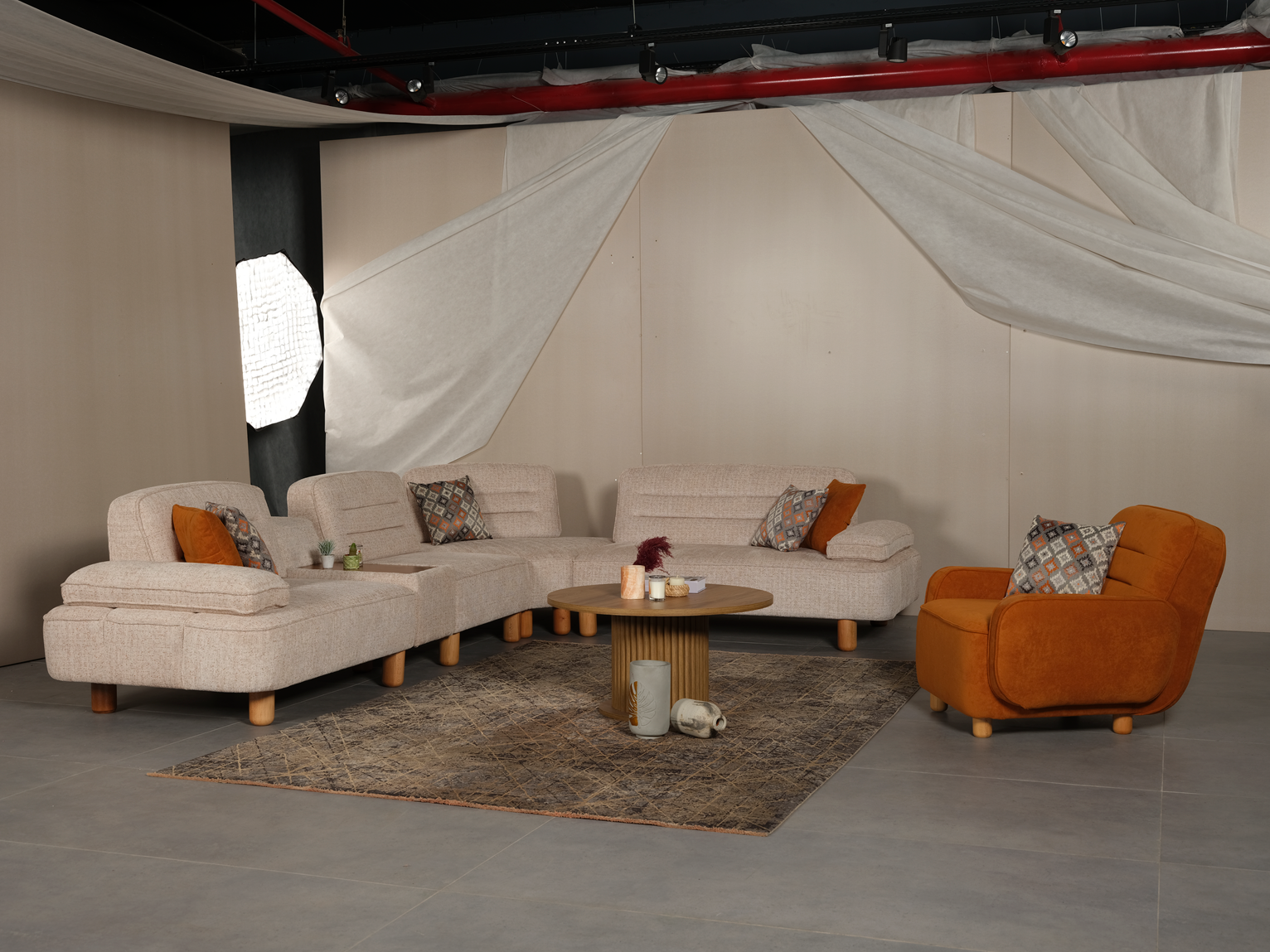 Netline Home Interior Armoni corner sofa set with plush cushions and spacious lounge design in a modern living room setting.