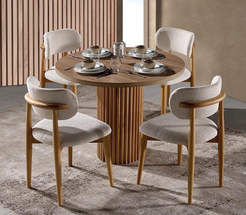 Modern Bohem dining room set with round table and matching chairs by Netline Home Interior, ideal for stylish entertaining.