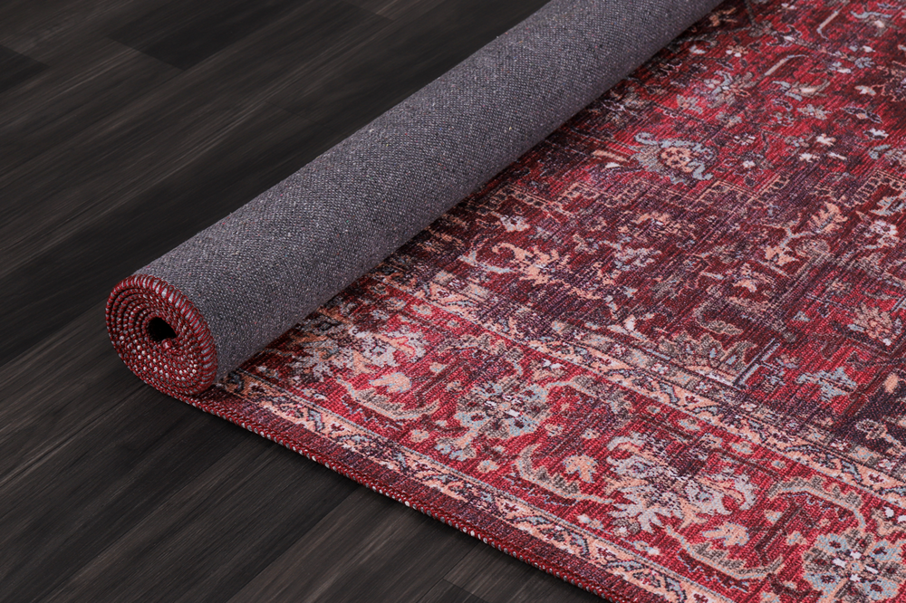 Multicolor geometric washable rug by Netline Home featuring tribal patterns and vibrant design in a modern, durable textile.