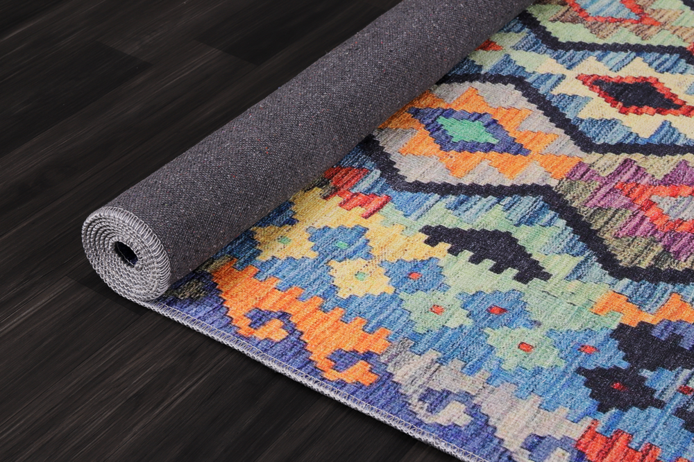 Multicolor tribal diamond geometric kilim rug by Netline Home, machine washable, ideal for living room, bedroom, or dining area.