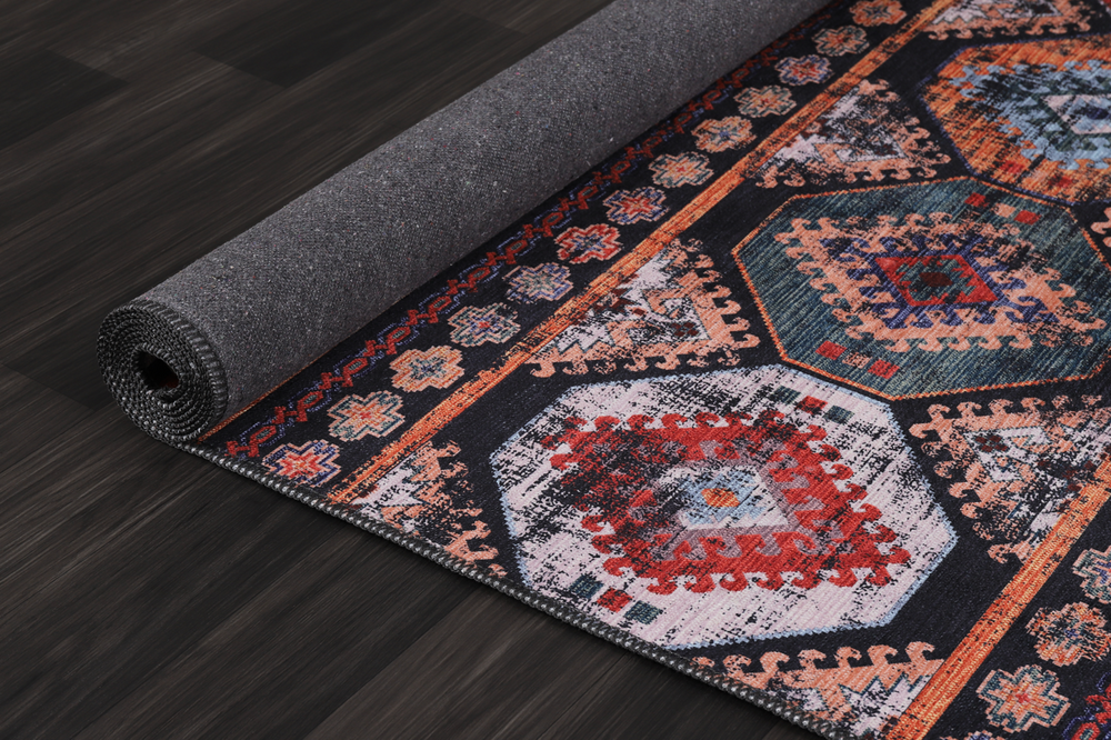 Black and white geometric patchwork washable rug by Netline Home, featuring a modern, stylish design with bold patterns.