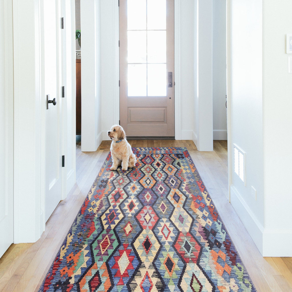 Colorful Kilim tribal geometric washable rug by Netline Home, showcasing vibrant patterns and non-slip cotton backing.