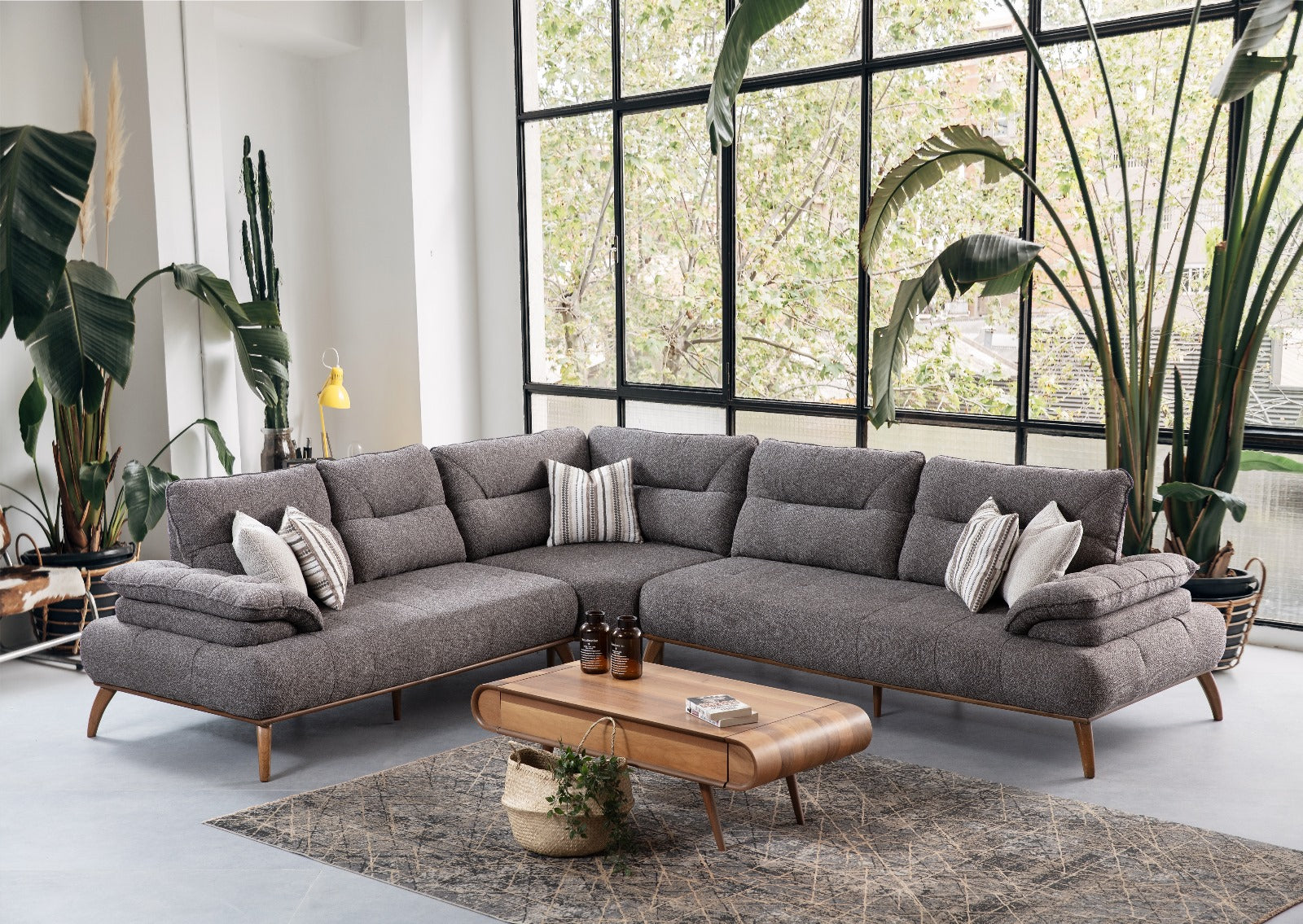 Spacious Latte Corner Sofa by Netline Home Interior, featuring plush cushions and a modern corner design for lounge comfort.