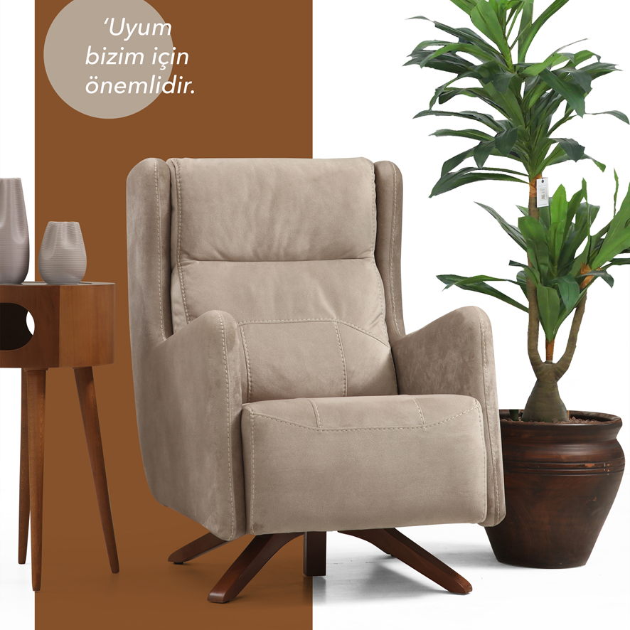 Netline Home Interior Rio Chair armchair with plush fabric and wooden legs, perfect for stylish and comfortable accent seating.