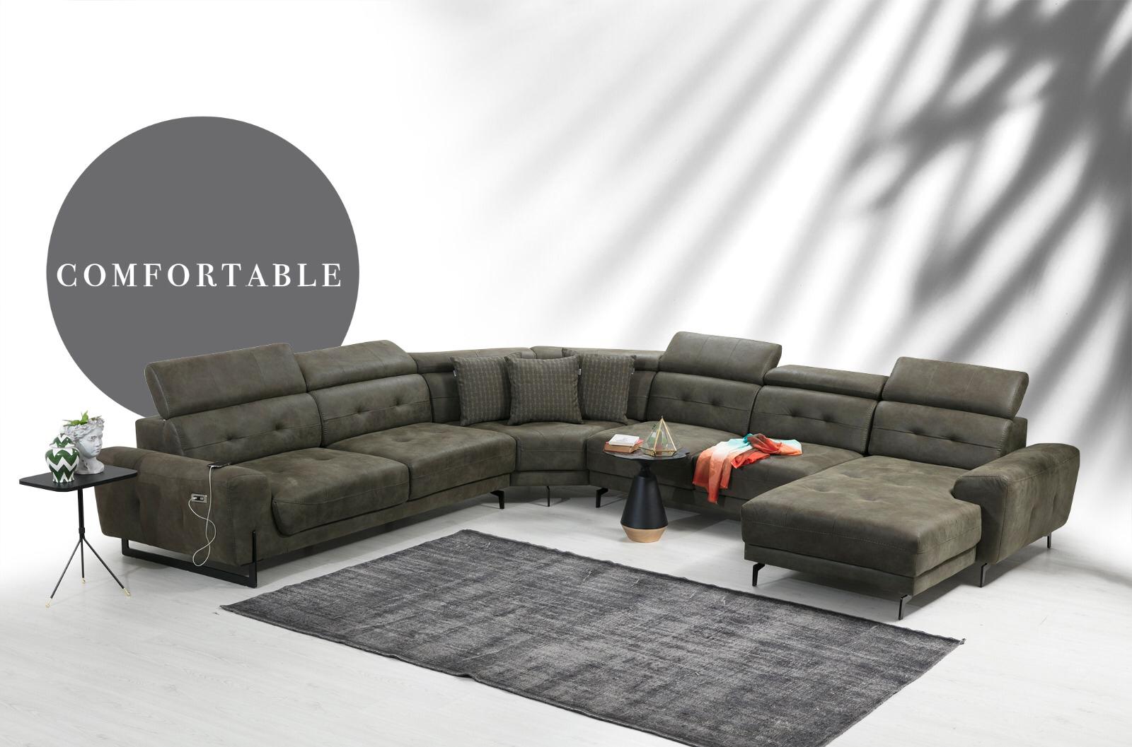 Lora U corner recliner sofa in fabric with plush cushions, designed for relaxed comfort, by Netline Home Interior.