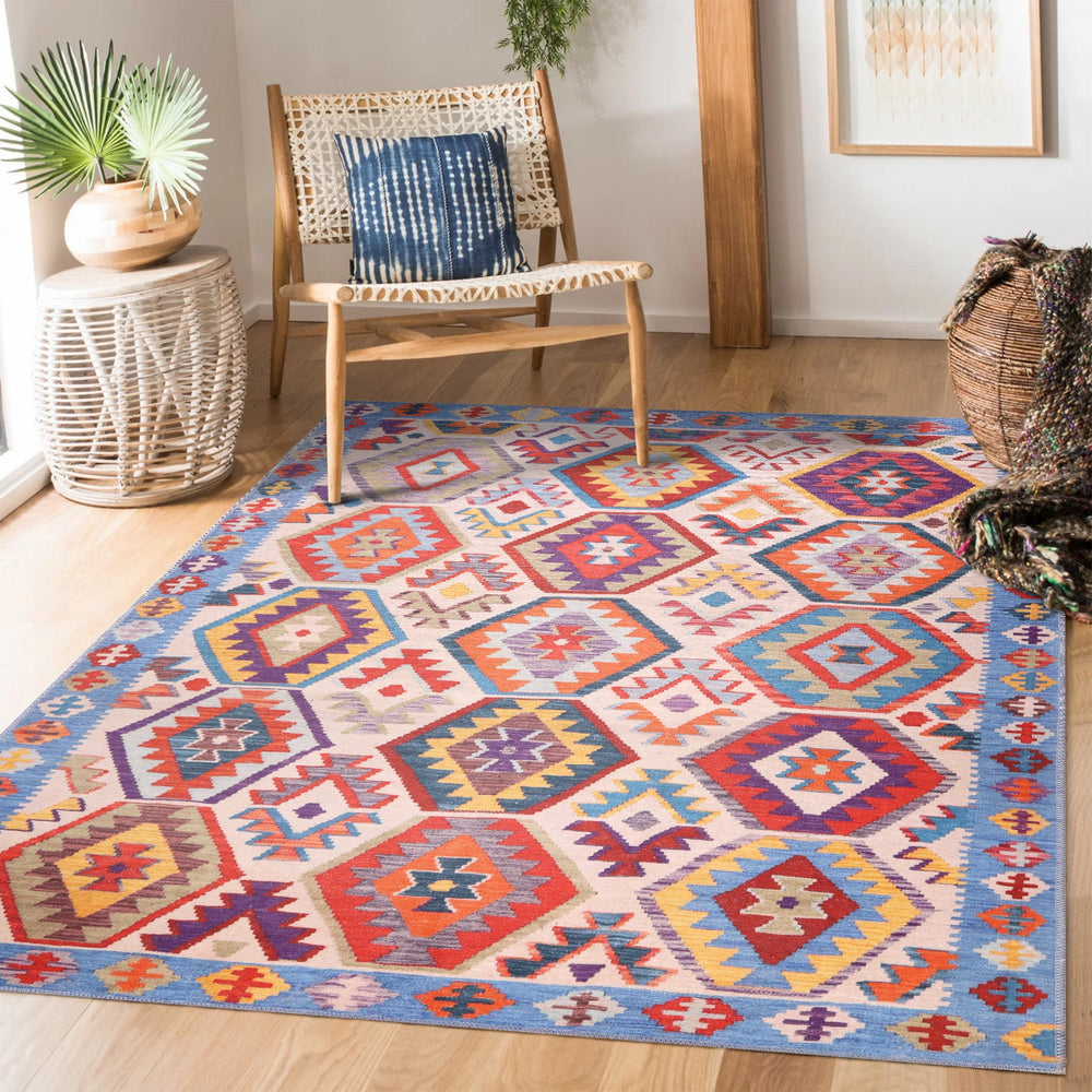 Machine washable blue abstract rug by Netline Home, featuring a modern design, perfect for living rooms or bedrooms.